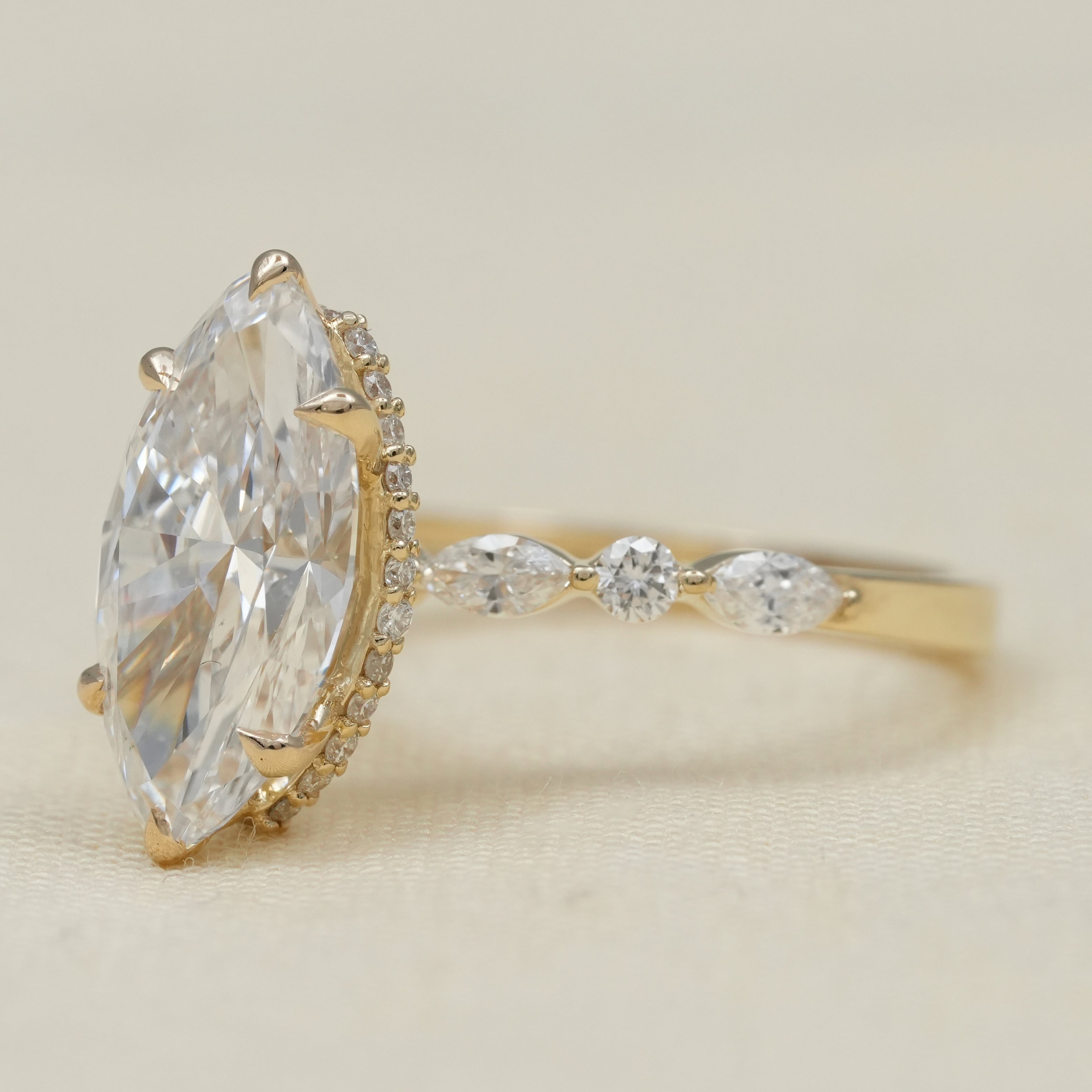 Luxury marquise lab grown diamond solitaire with diamond accents