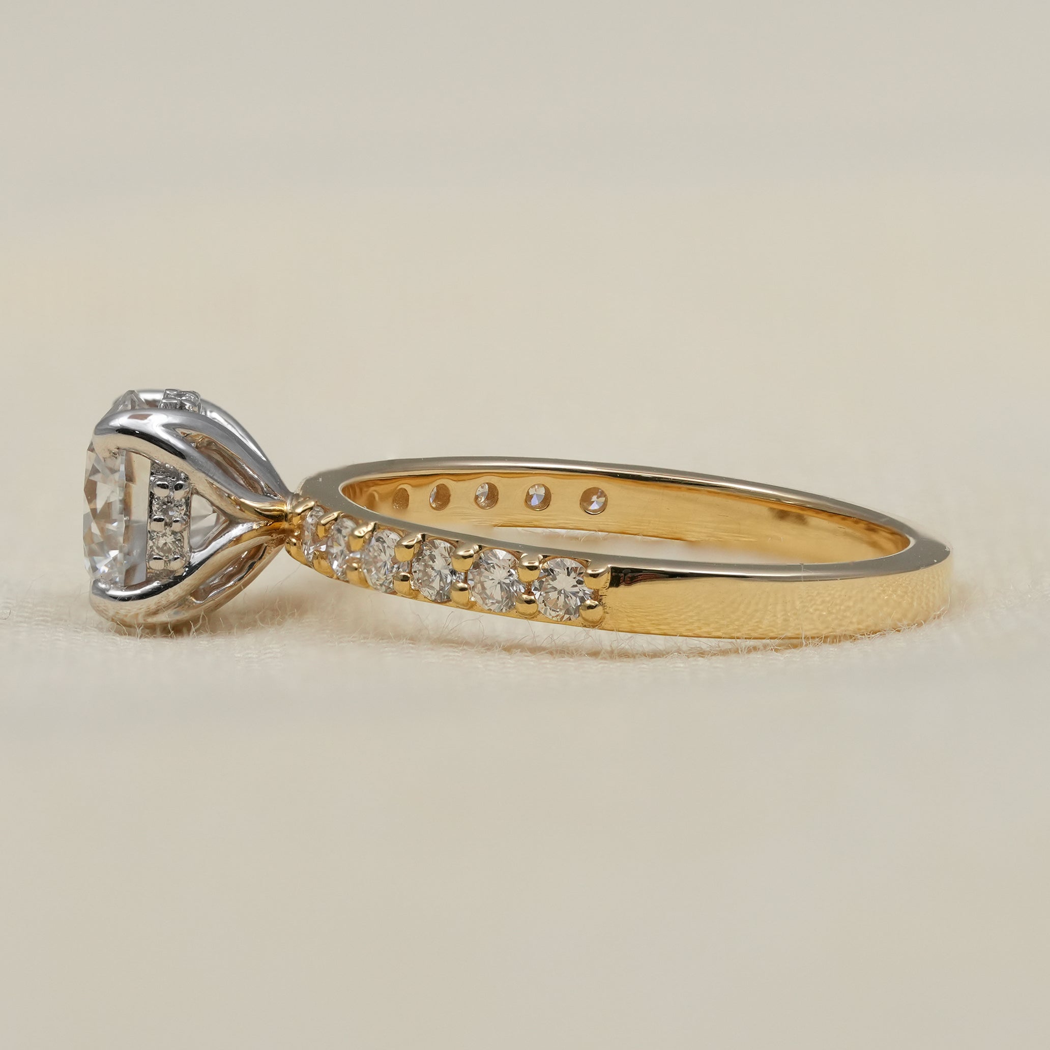 Elegant round lab grown diamond engagement ring with pavé accents