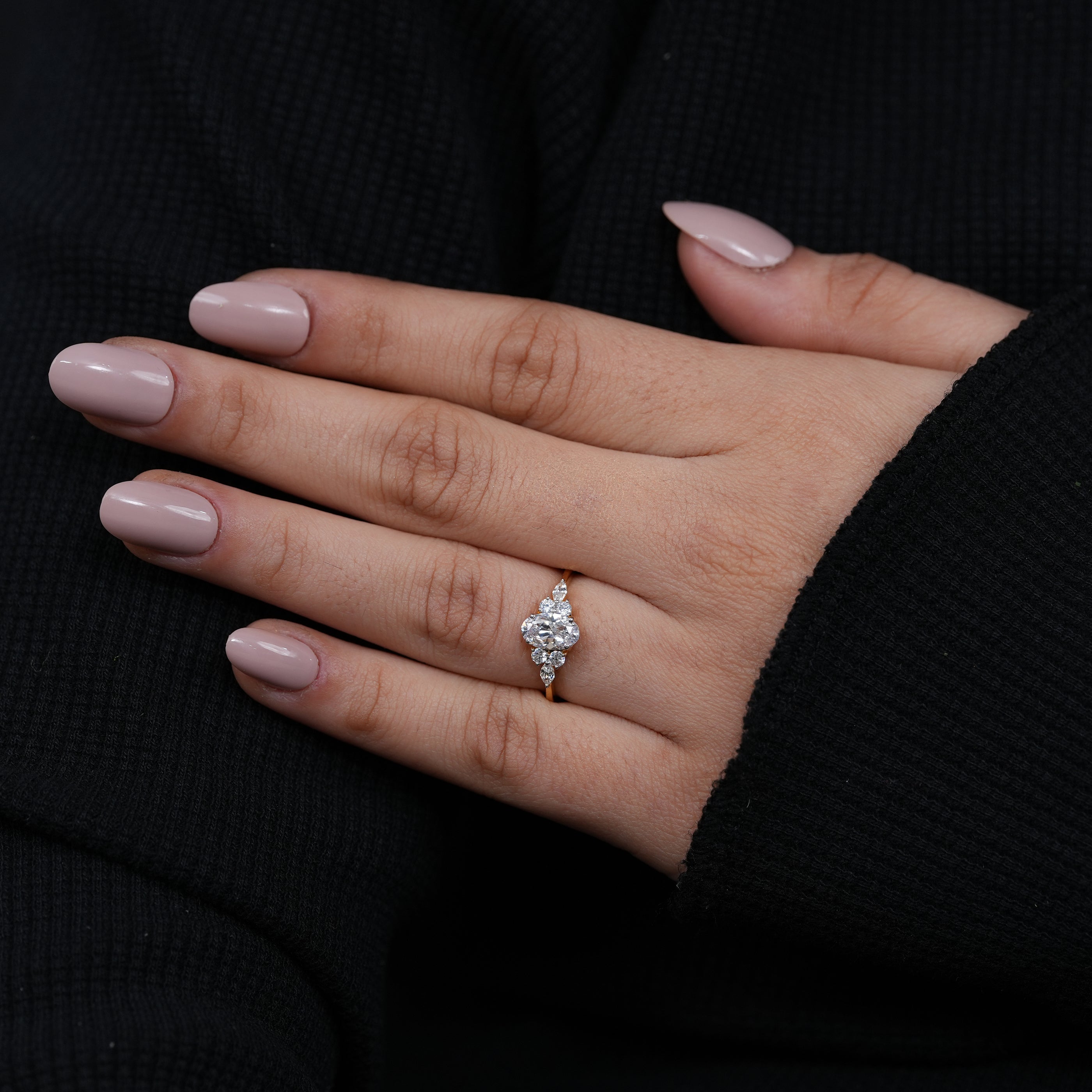 Romantic oval lab grown diamond engagement ring with sparkling side clusters