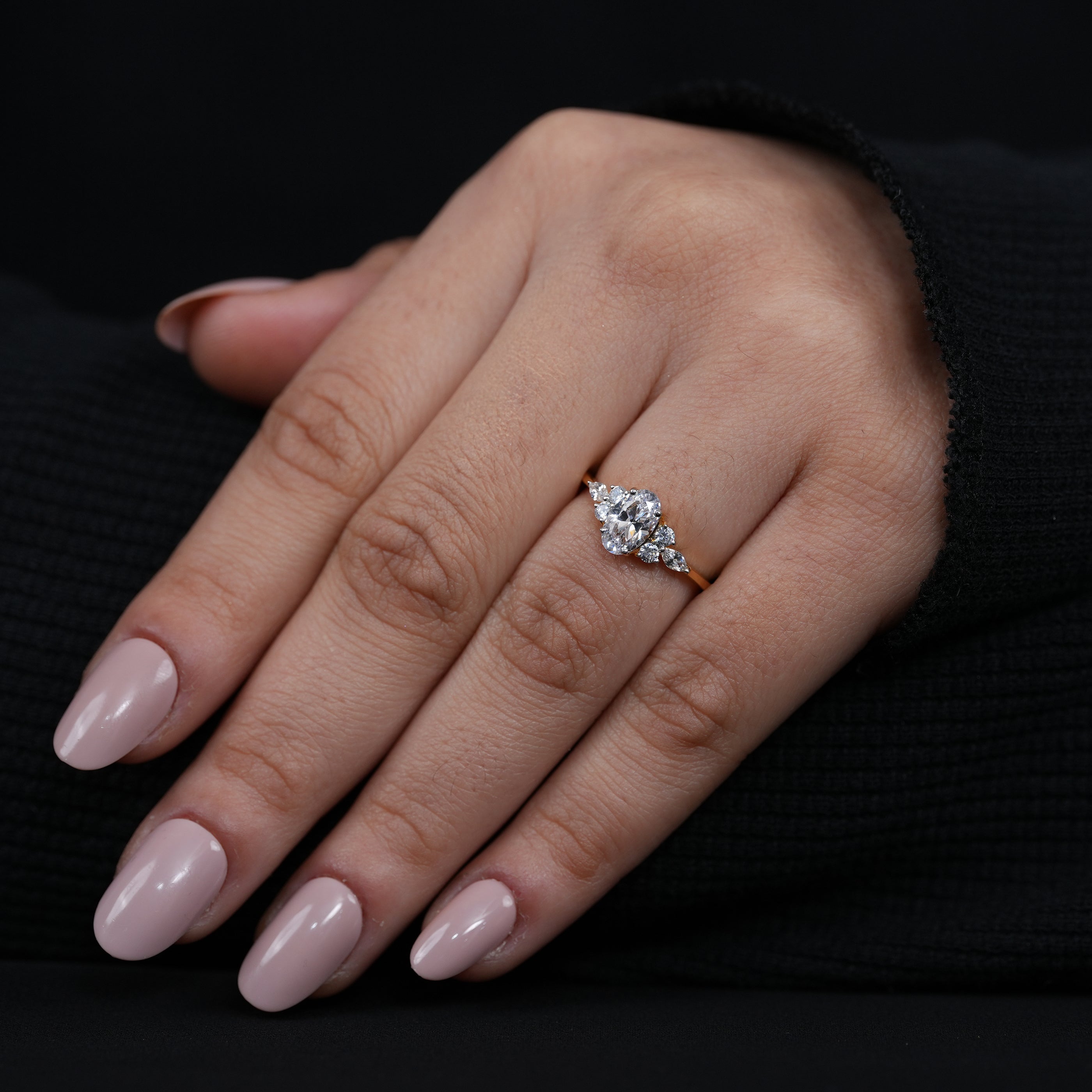 Timeless oval lab grown diamond engagement ring with sculpted gold band
