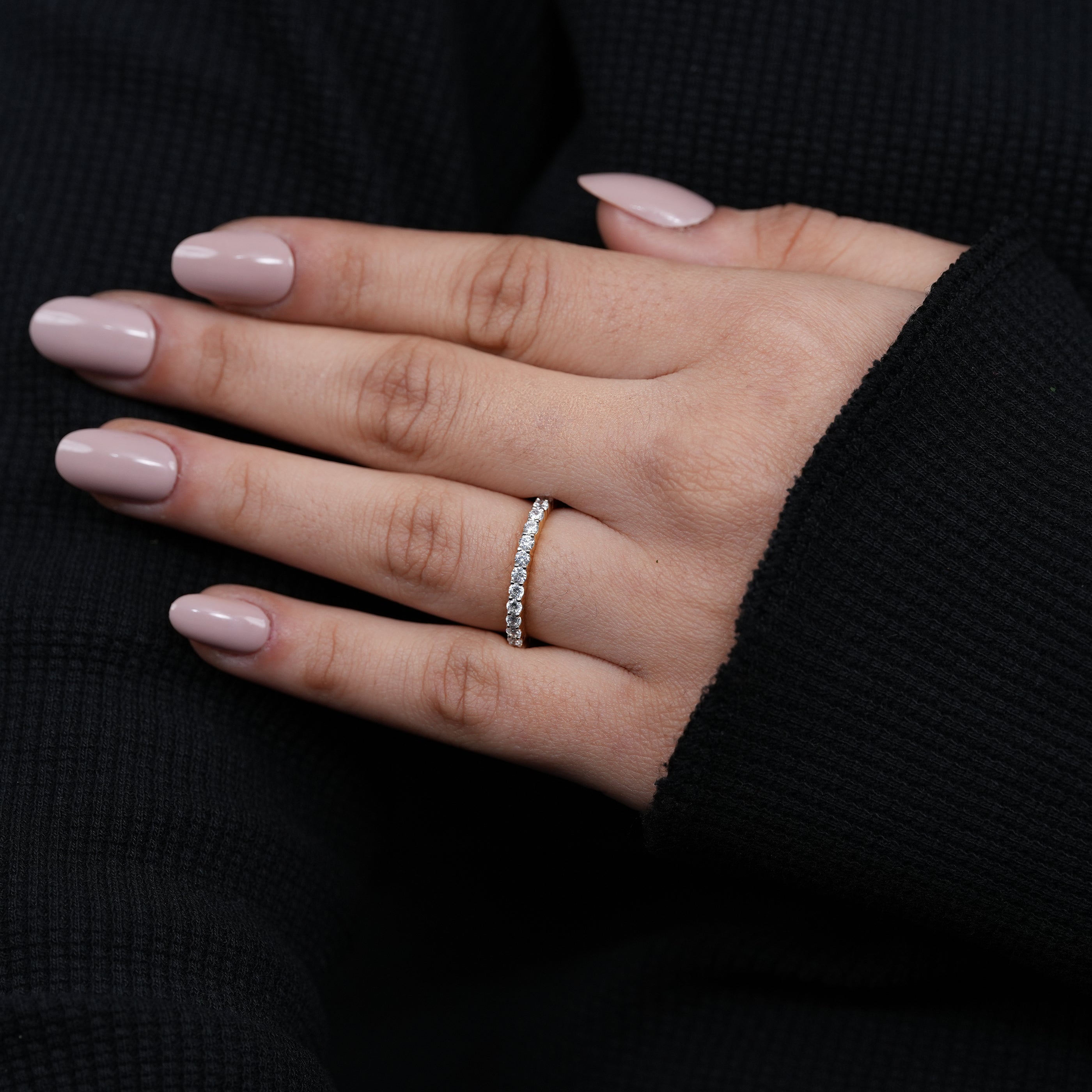 Slim luxury wedding band featuring continuous round lab grown diamonds