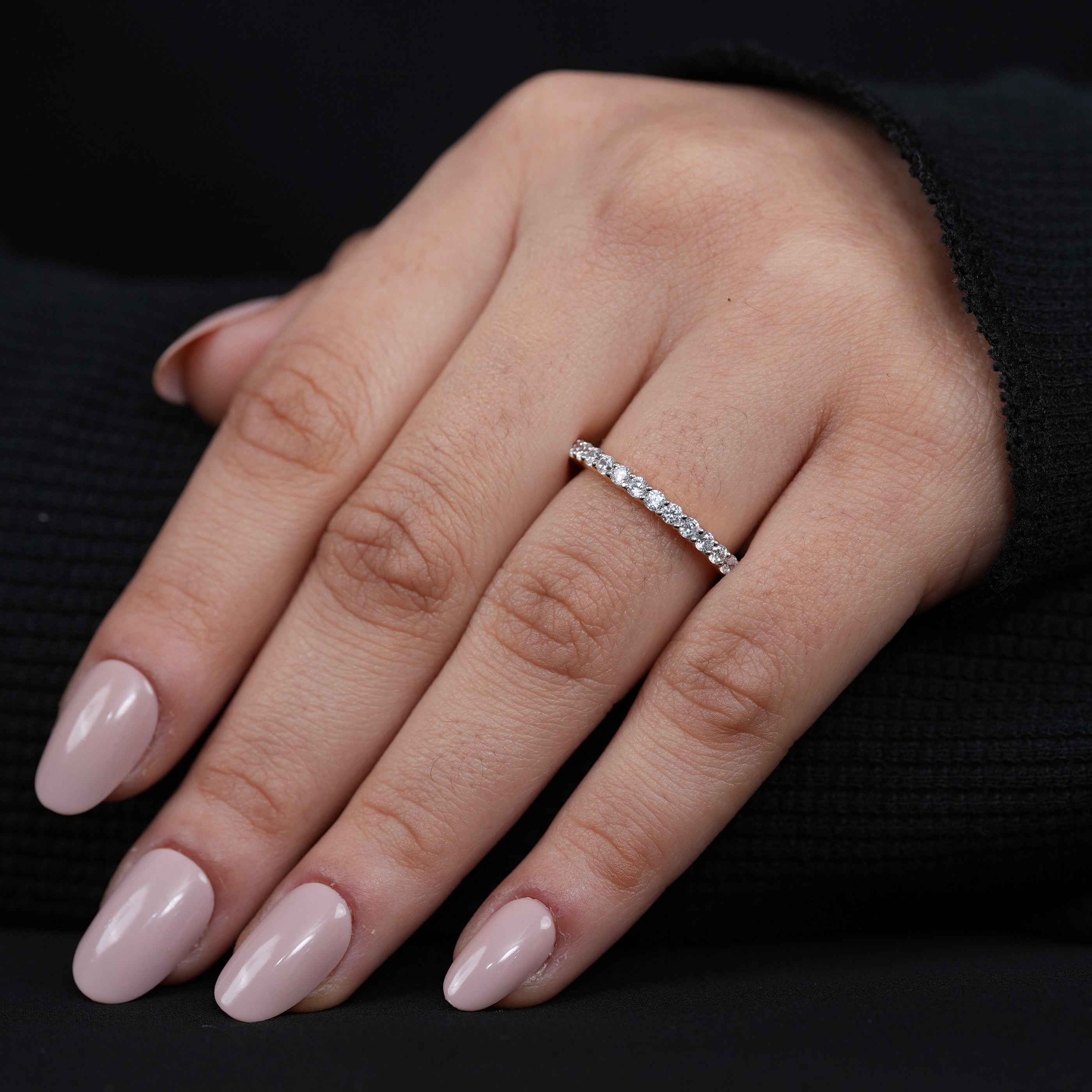 Elegant eternity ring with open gallery and prong set lab grown diamonds