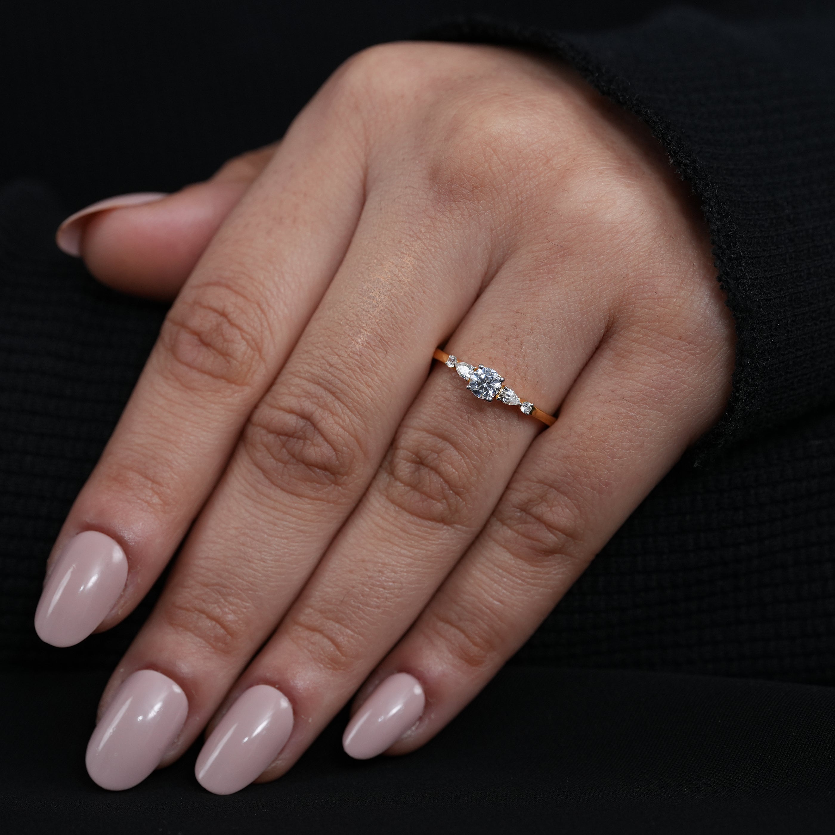 Refined yellow gold ring with round lab grown diamond and dainty side stones