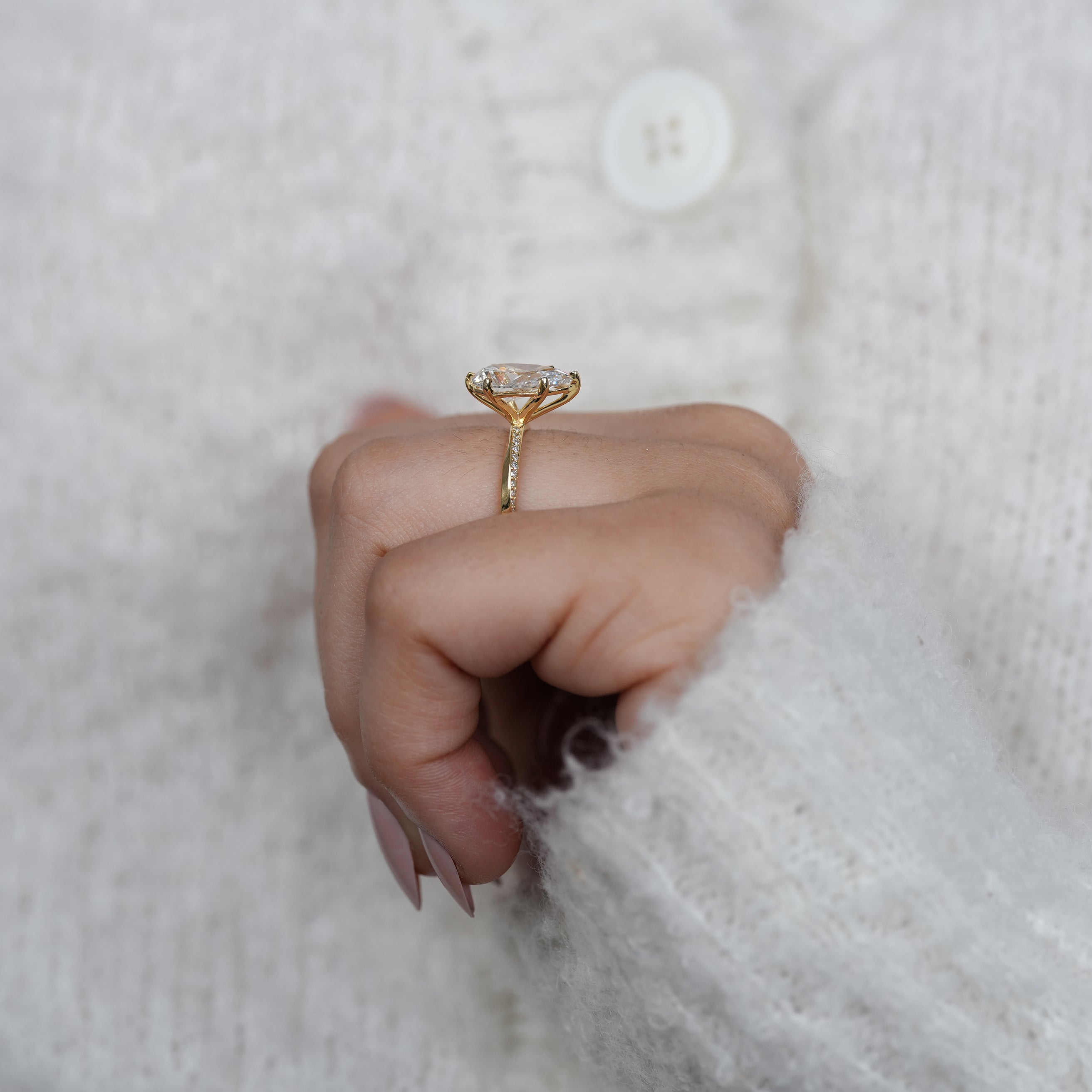 Timeless pear lab grown diamond engagement ring with pavé accents