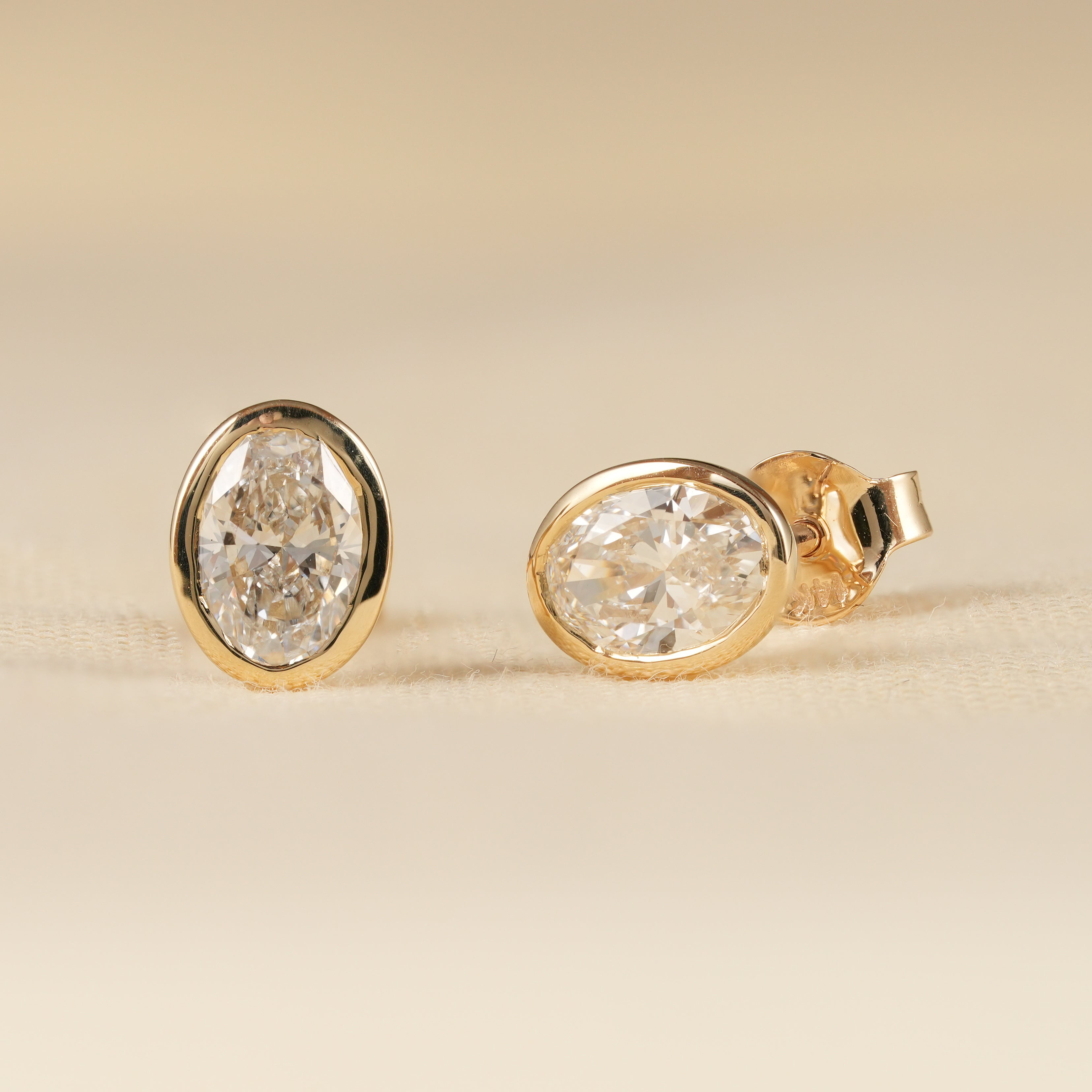 Yellow Gold Bezel Set Oval Diamond Stud Earrings for Women