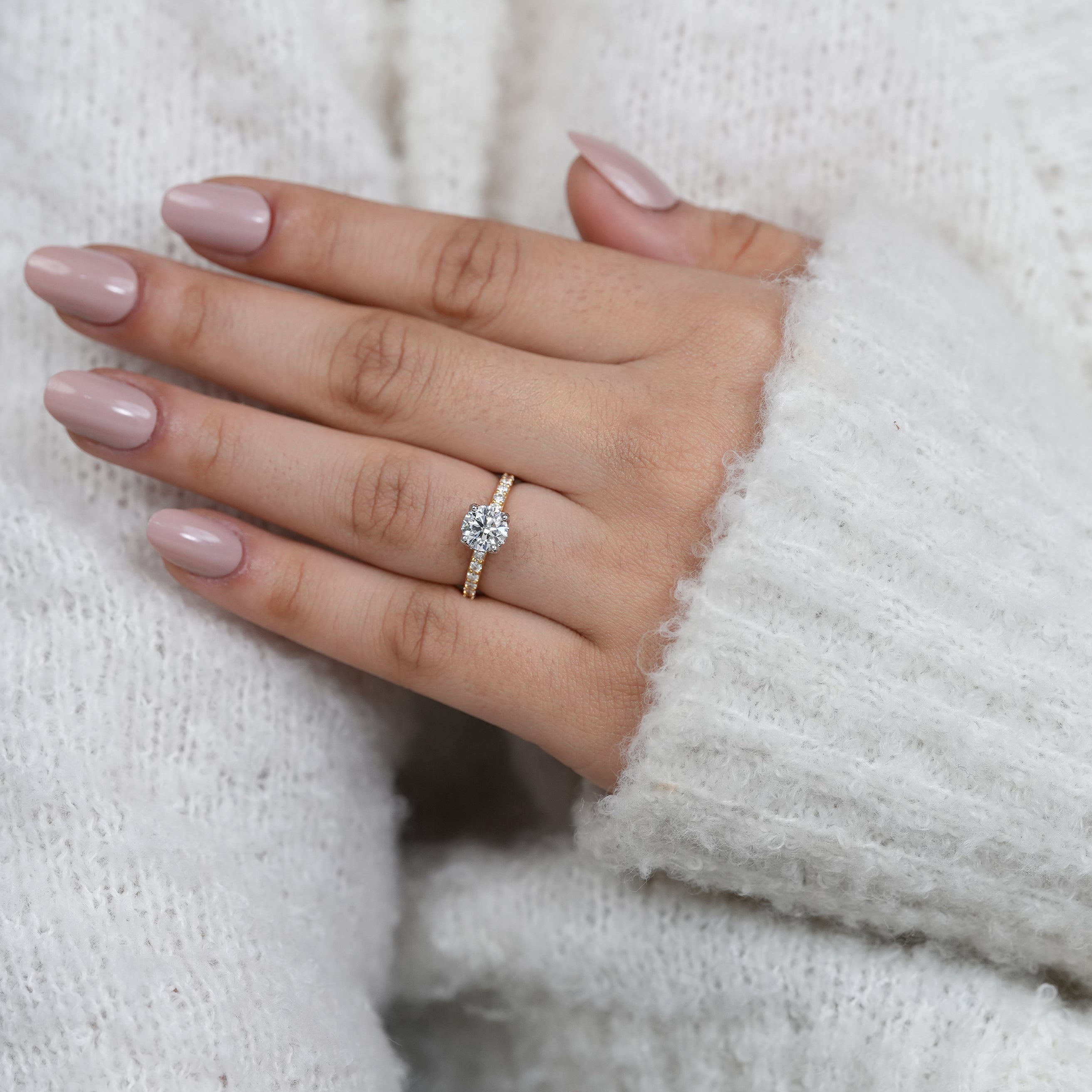 Minimal yellow gold ring with round lab grown diamond center