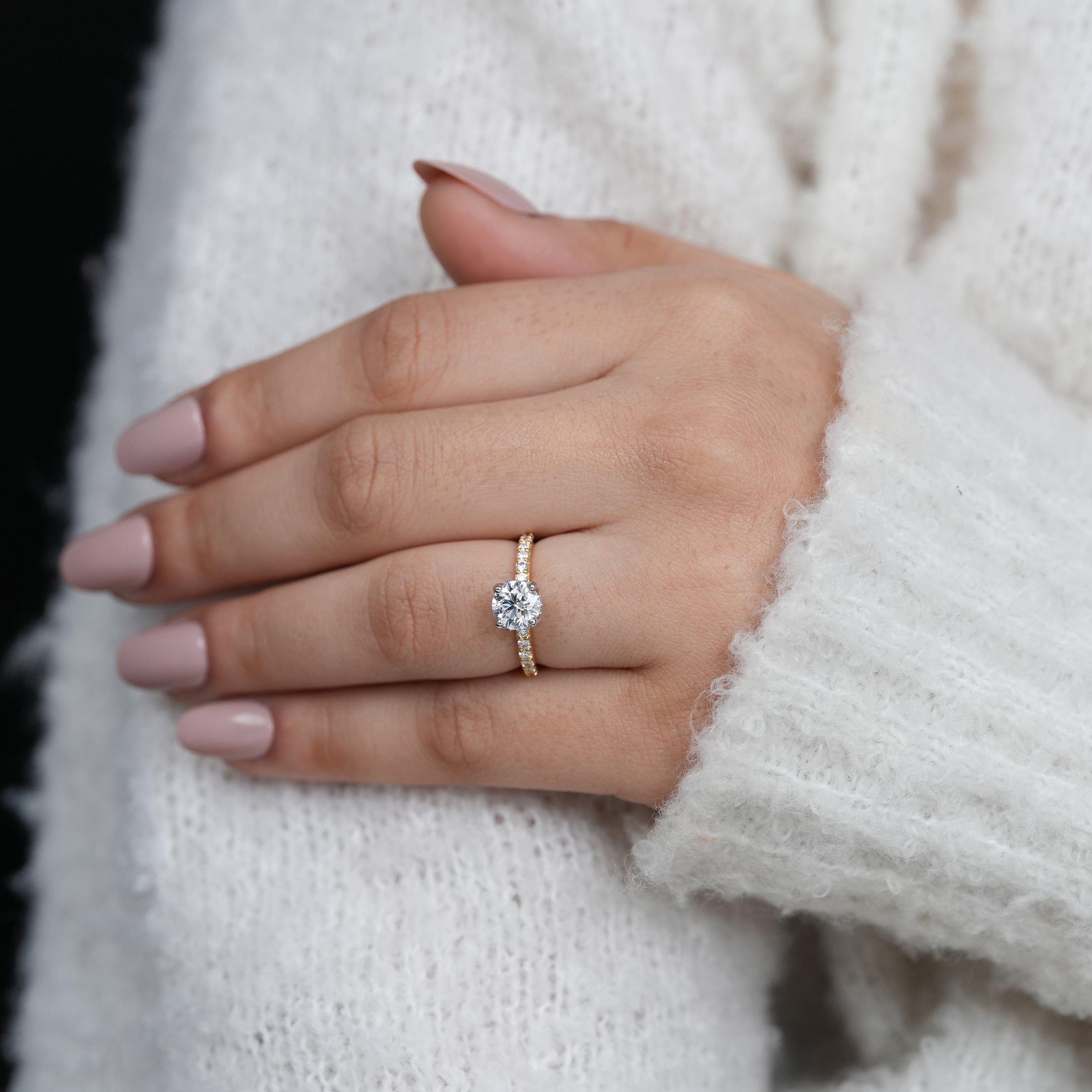 Timeless round lab grown diamond ring with delicate pavé band