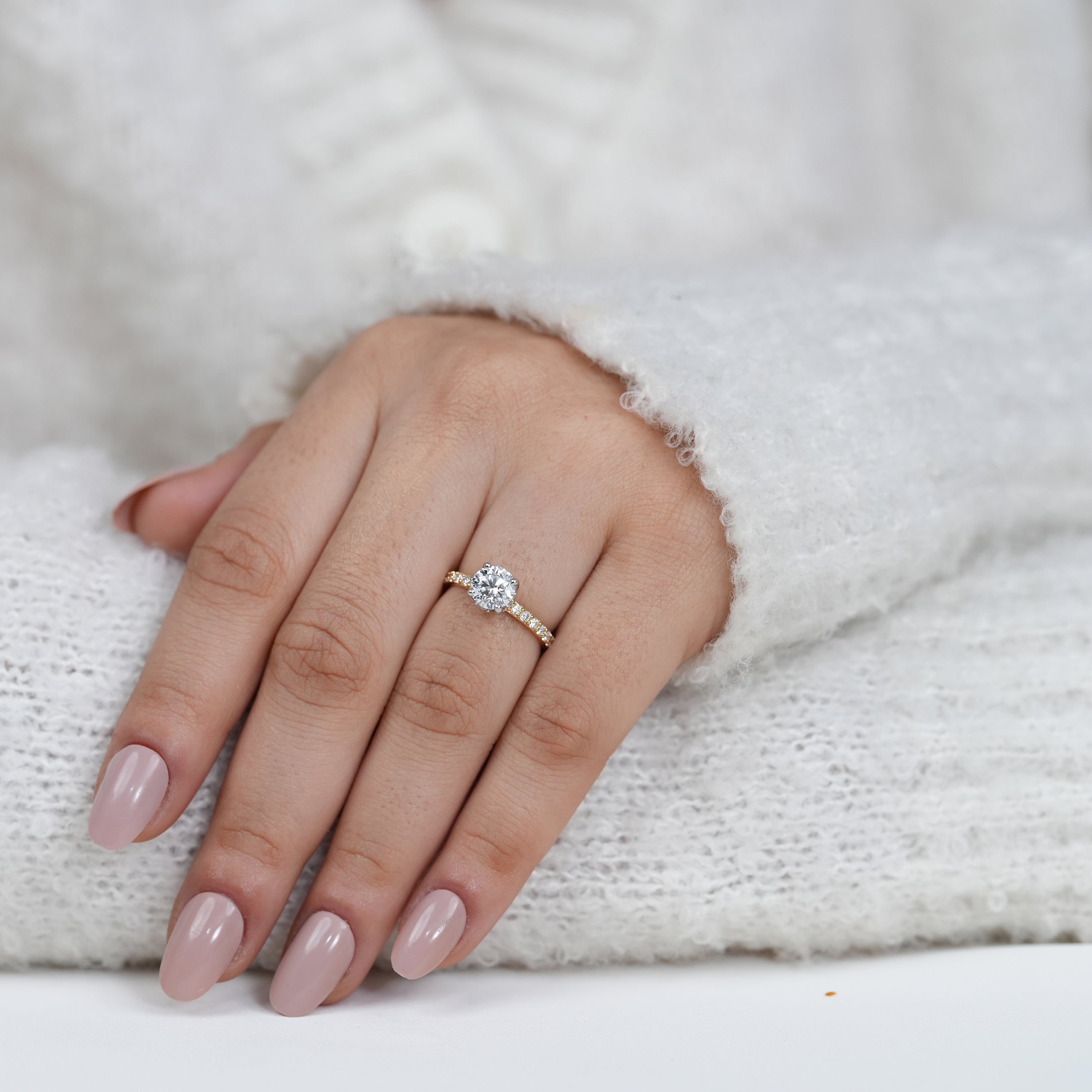 Luxury round lab grown diamond ring with sparkling pavé shoulders