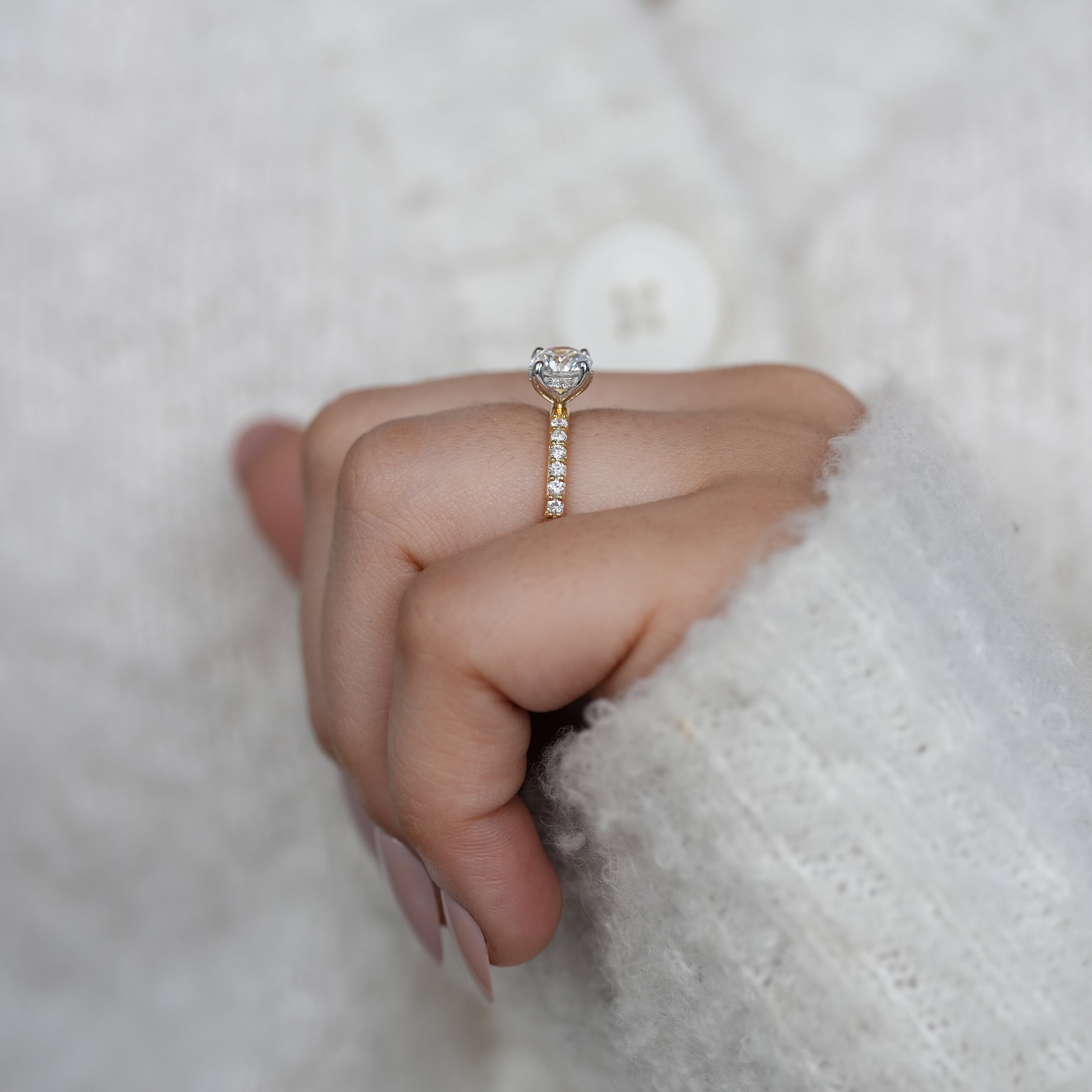 Four prong round lab grown diamond ring in yellow gold band