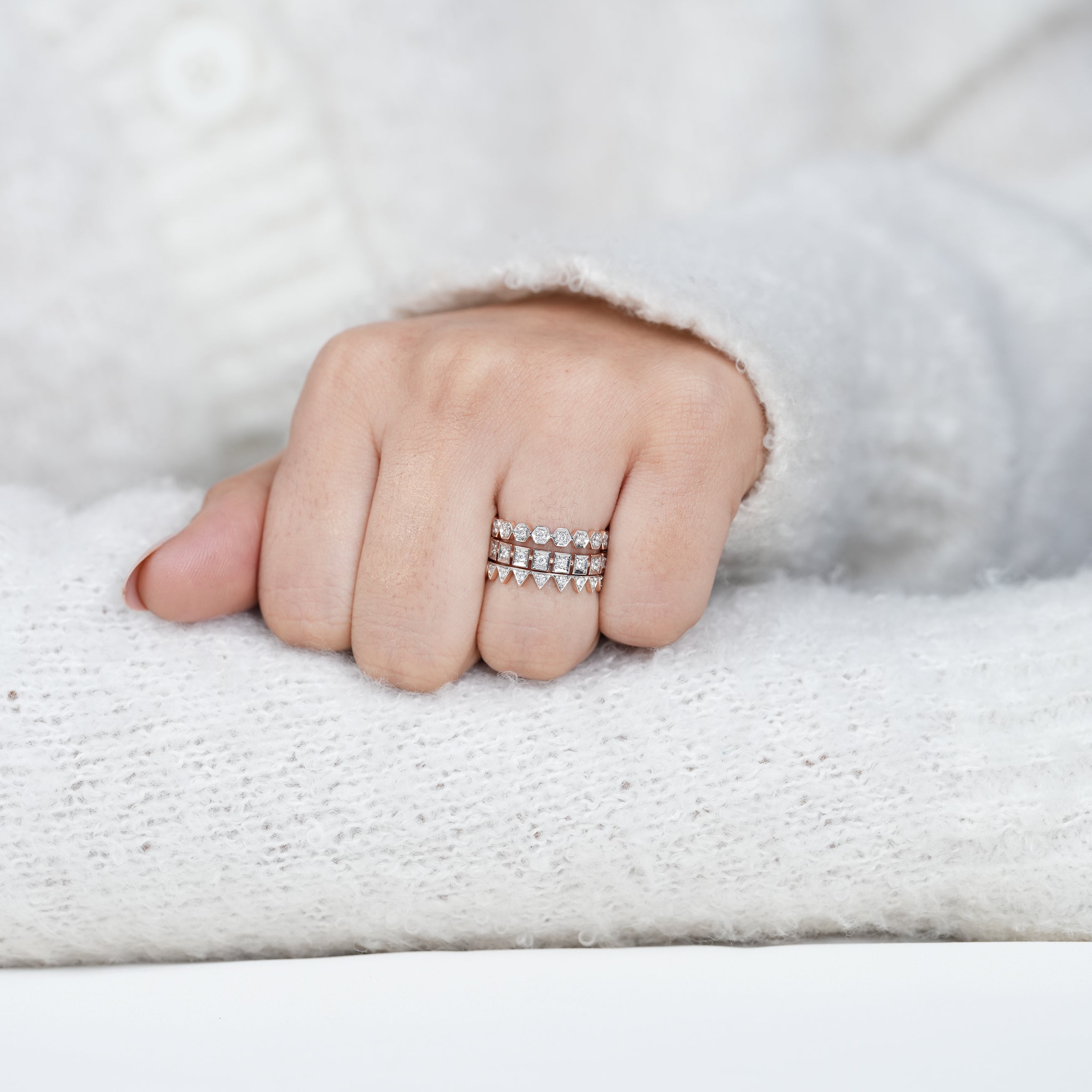 Luxury geometric diamond ring stack with royal crown silhouette