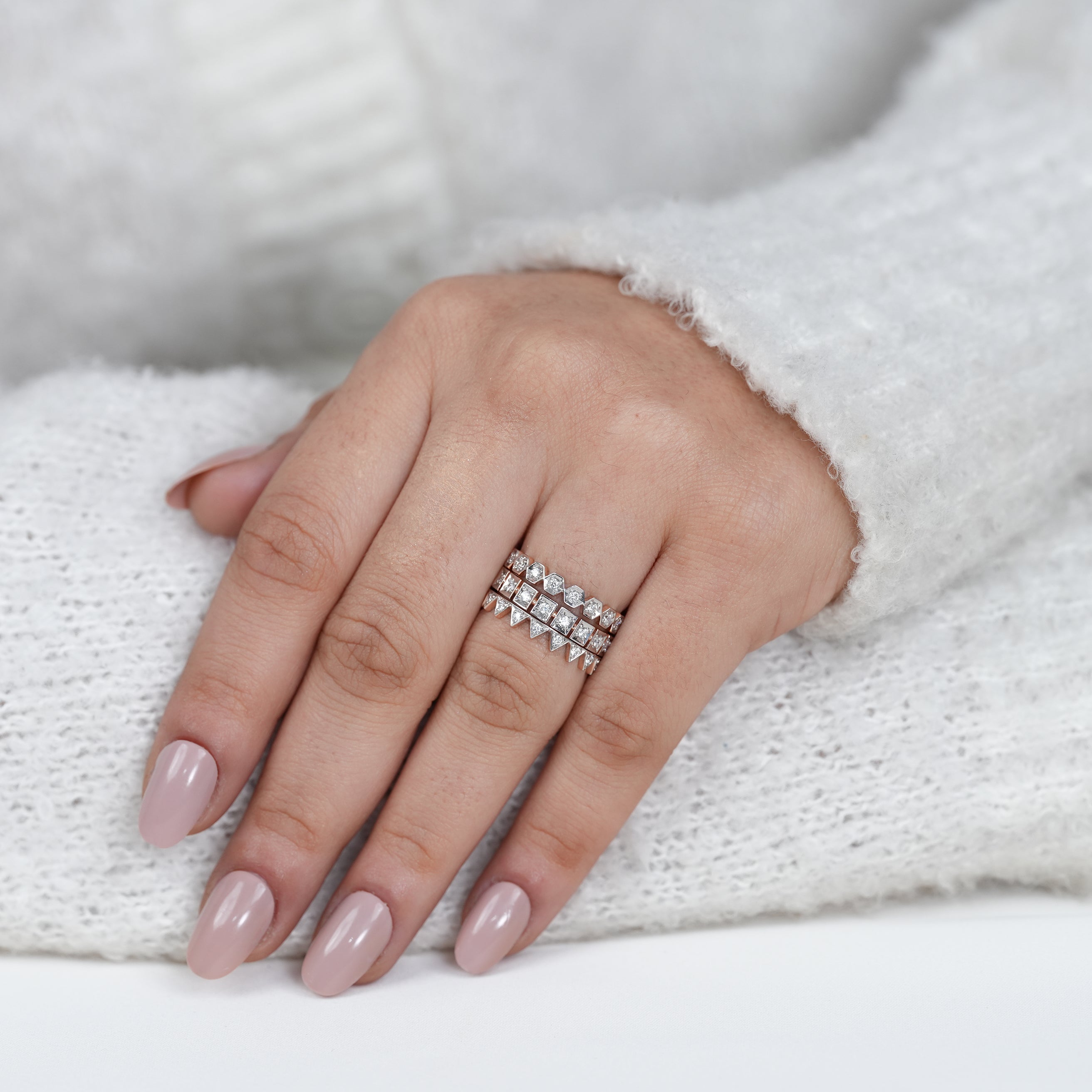 Contemporary crown style diamond bands in rose and white gold