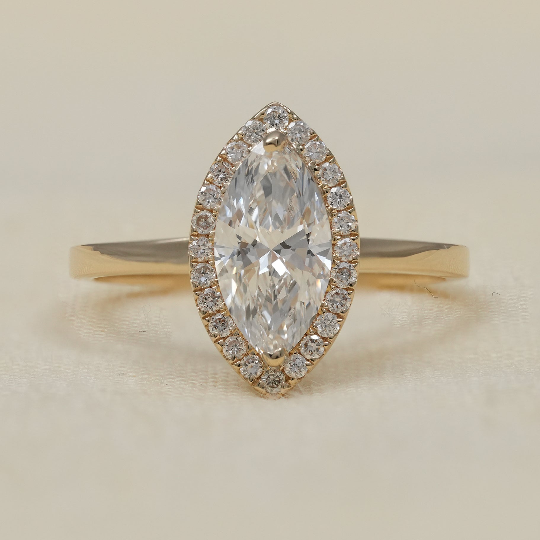 Marquise Cut Diamond Halo Engagement Ring in Solid Gold