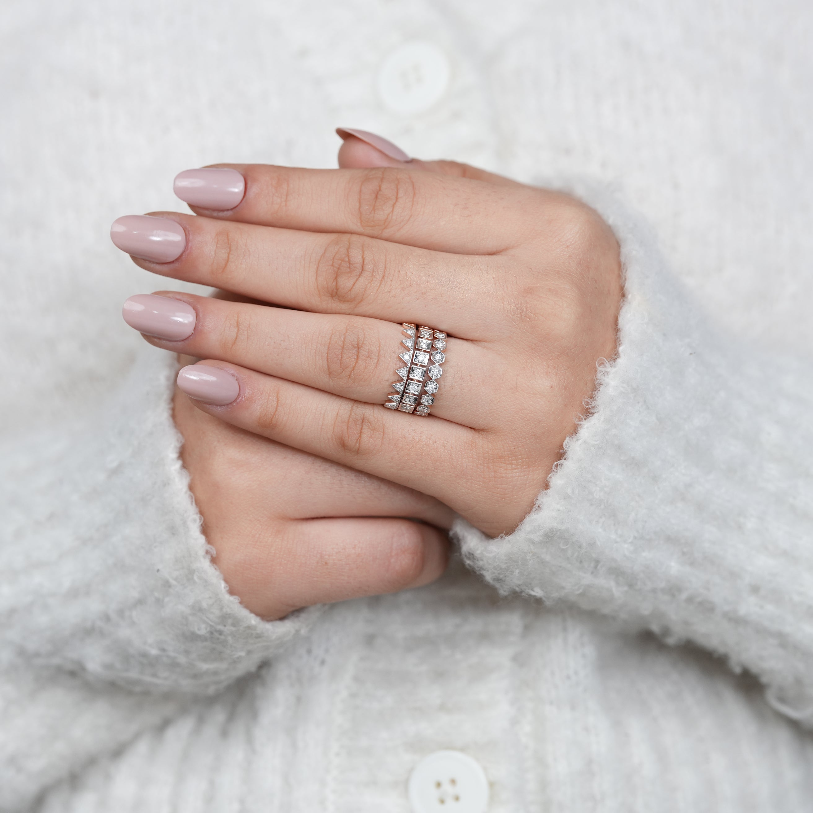 Unique crown inspired diamond stacking ring set with modern design