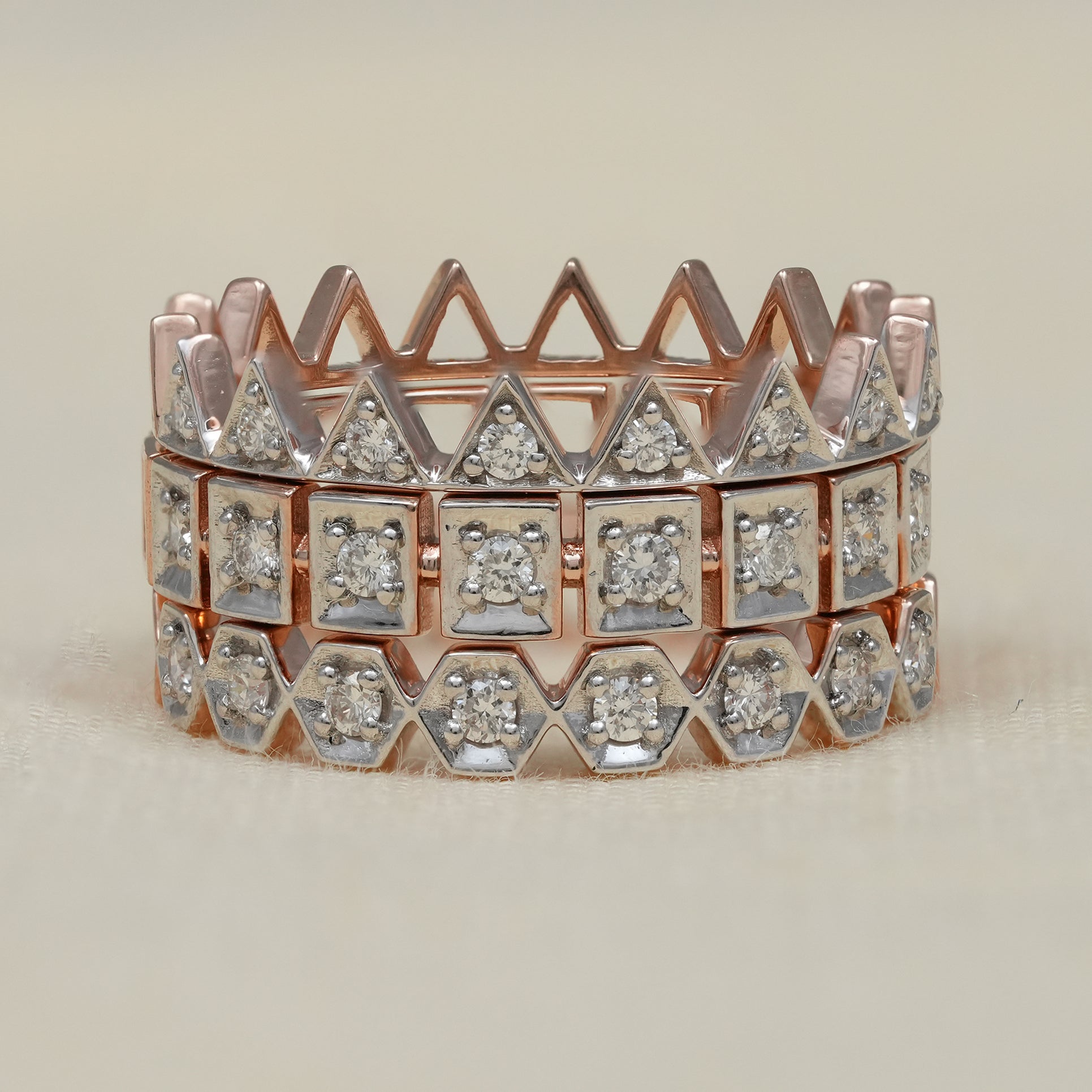 Crown style diamond stackable ring set in rose and white gold