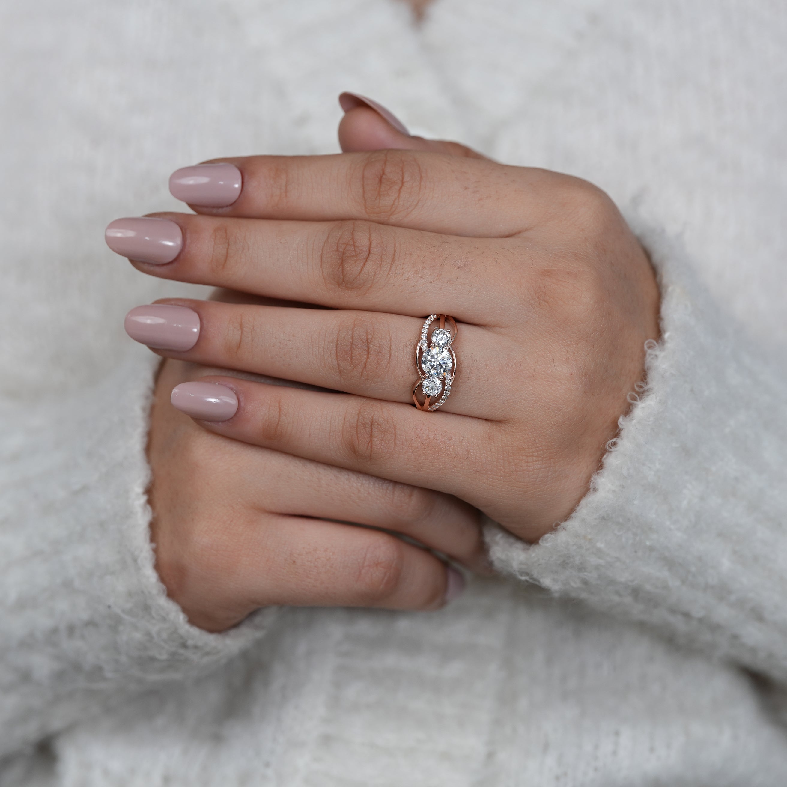 Modern rose gold lab grown diamond ring with flowing twist design