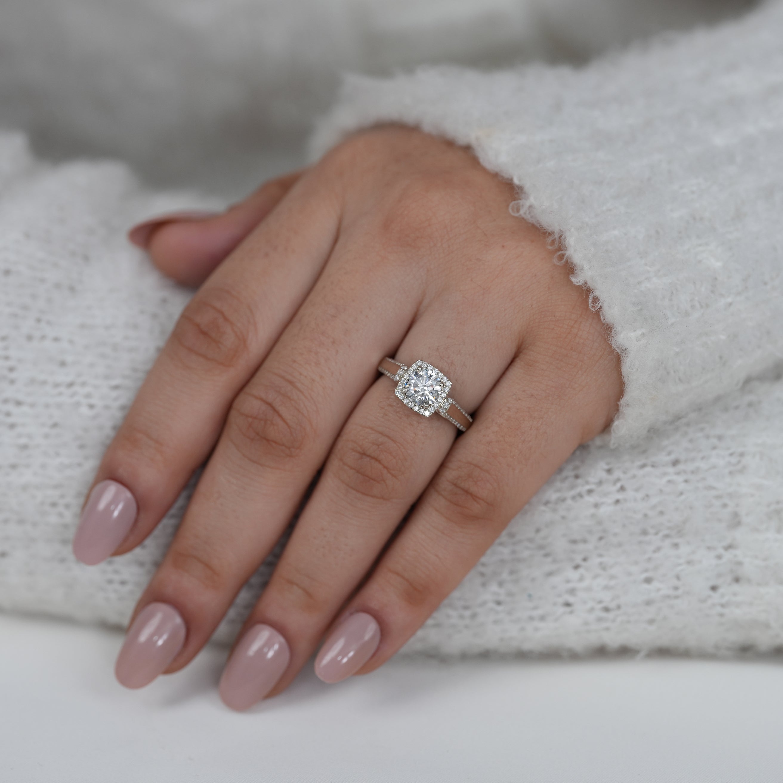 Modern white gold ring with round lab grown diamond halo design