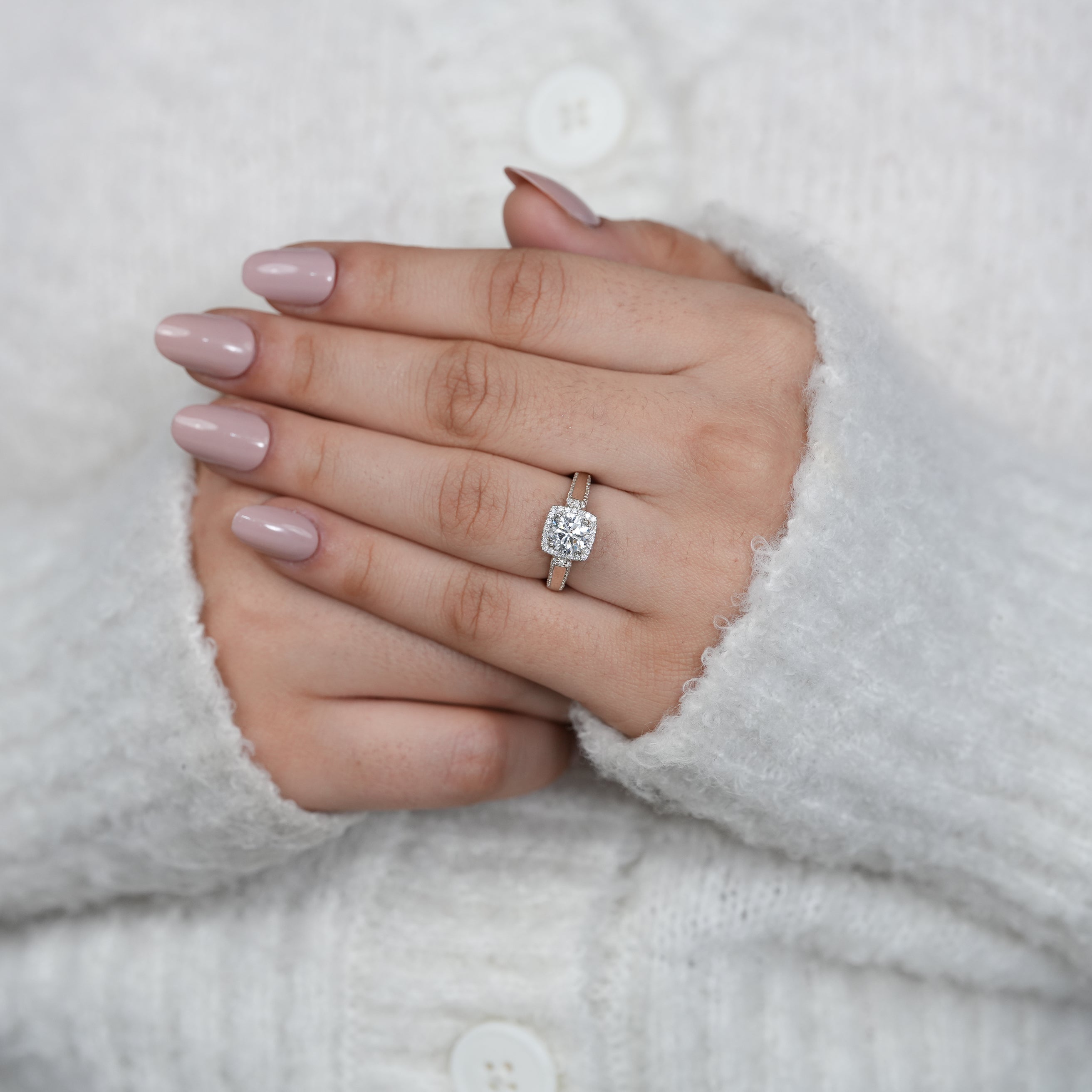 White gold engagement ring with round lab grown diamond and halo sparkle