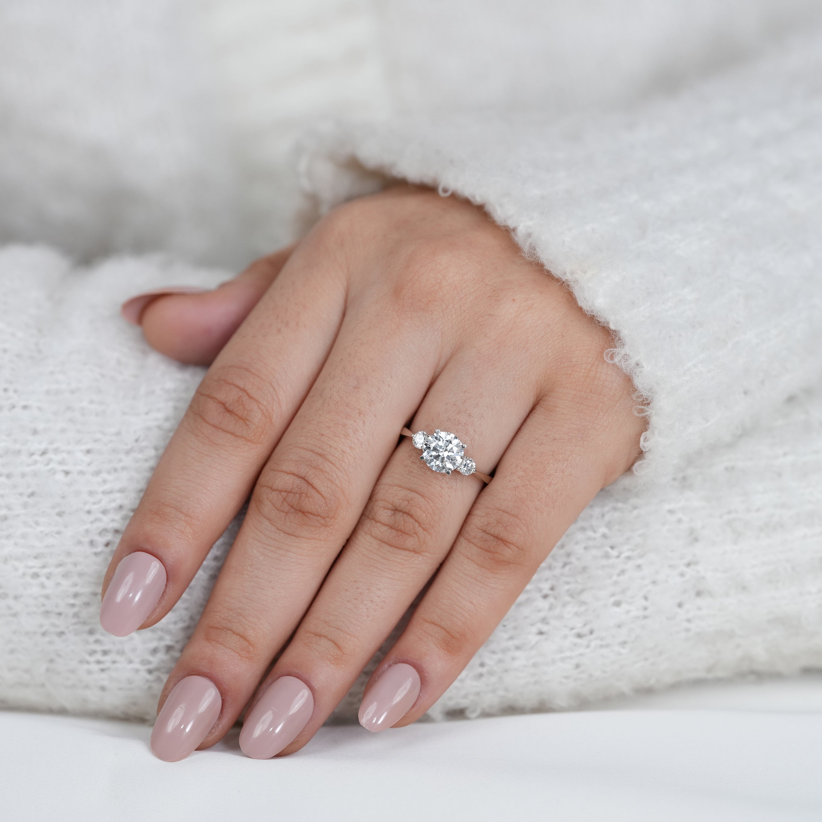 Luxury three stone lab grown diamond engagement ring with slim band