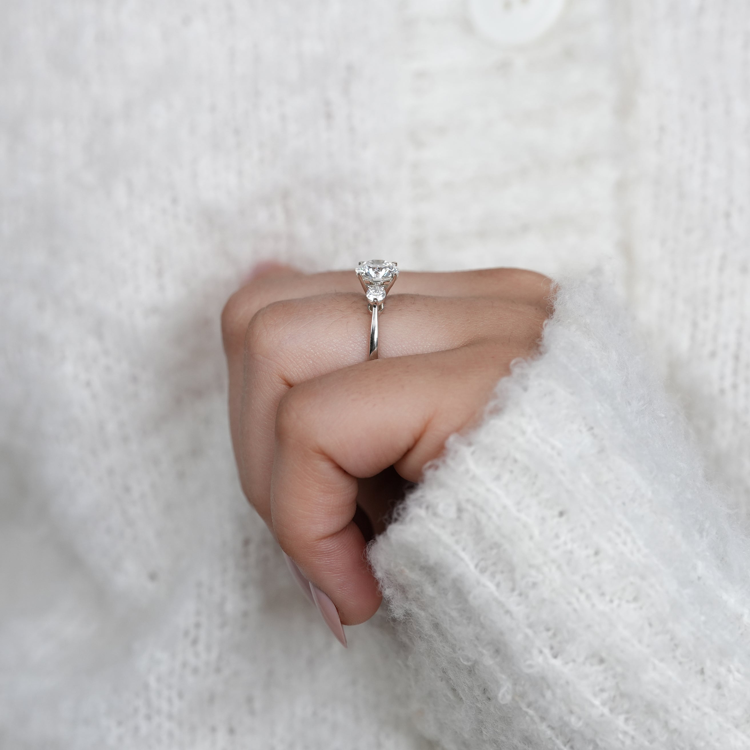 Contemporary white gold trilogy ring with brilliant lab grown diamonds