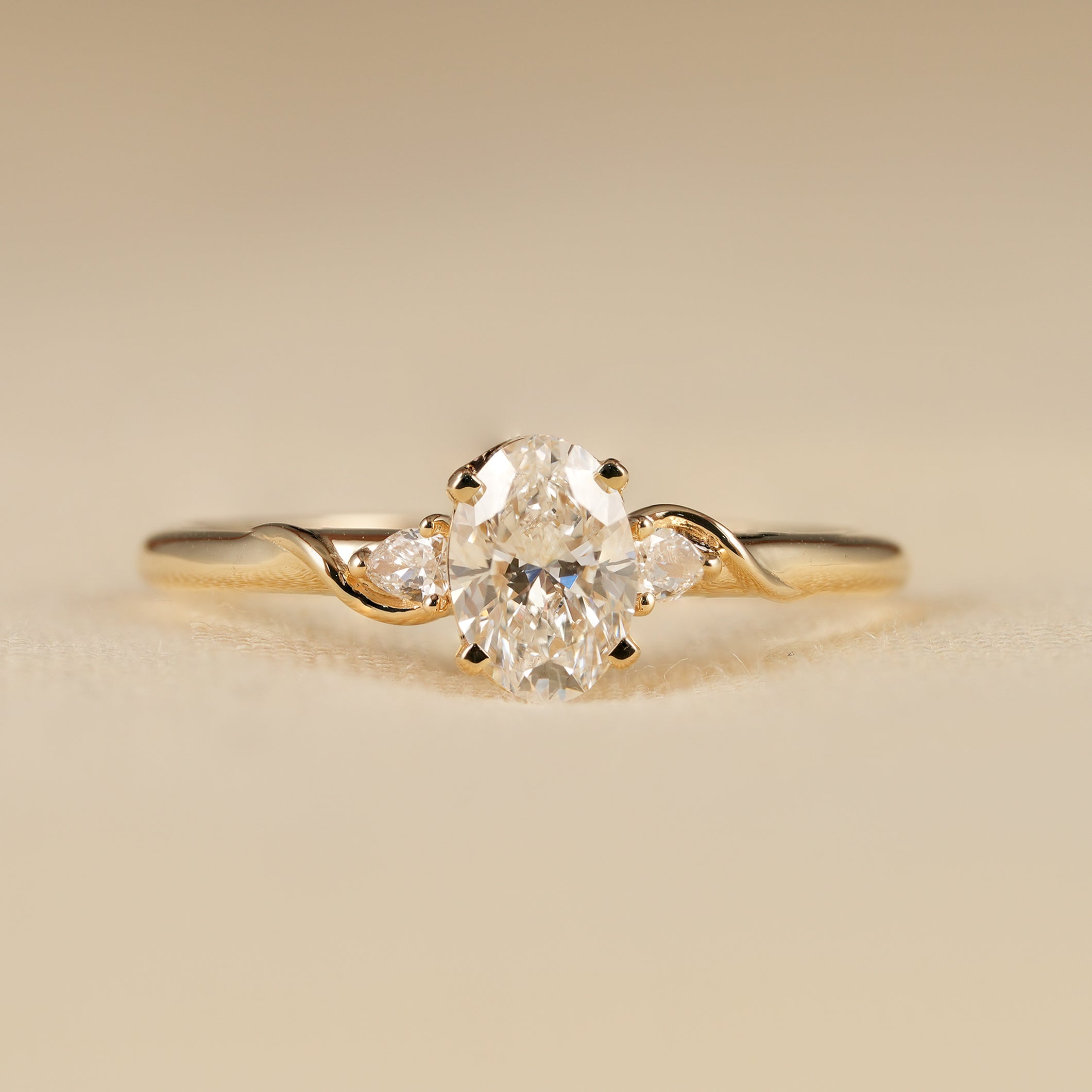 Three Stone Oval Lab Diamond Engagement Ring with Pear Side Stones