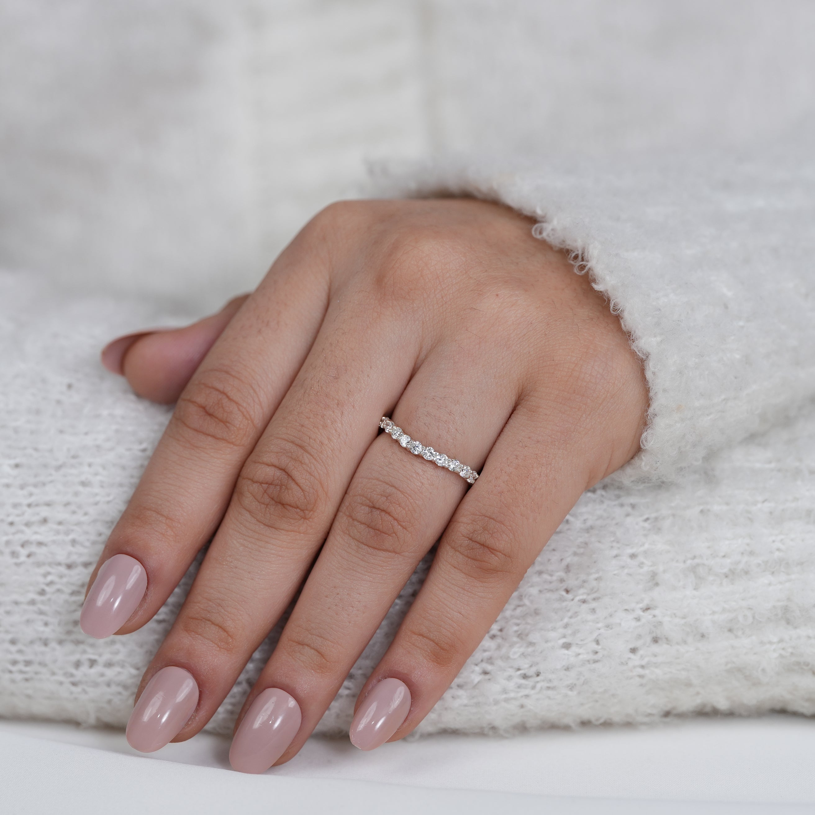 Slim white gold eternity band with sparkling lab grown diamonds