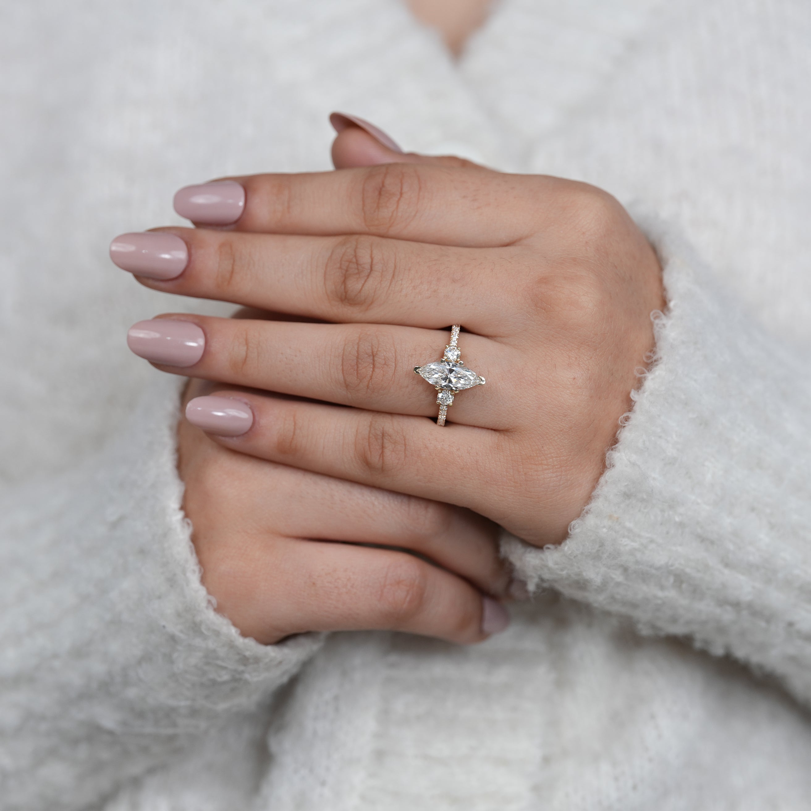 Yellow gold marquise lab grown diamond ring with delicate pavé band
