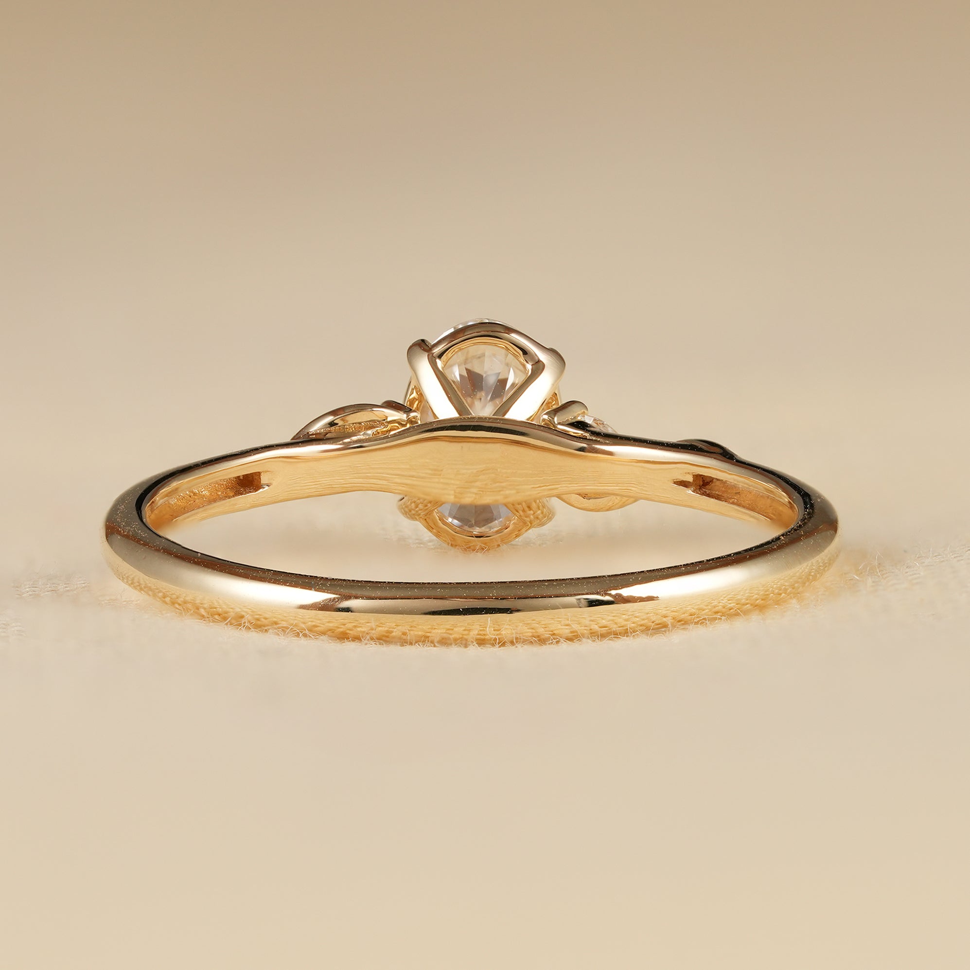 Elegant Three Stone Oval Diamond Engagement Ring with Twisted Band