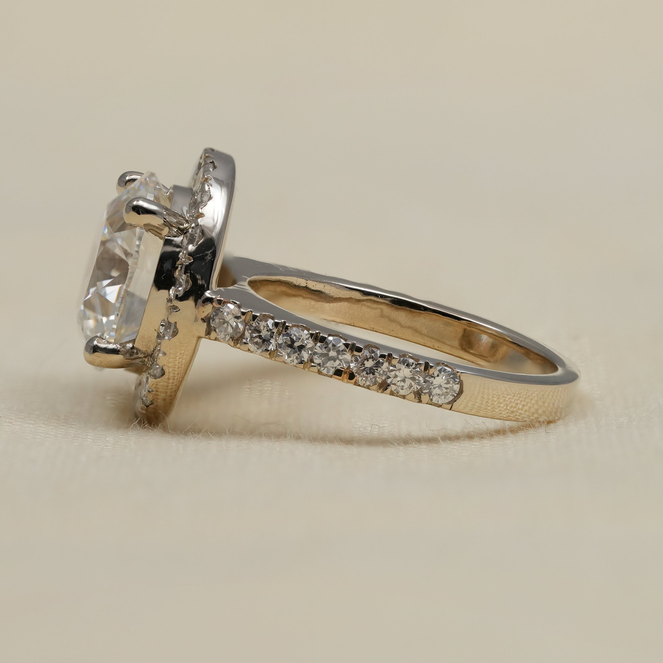 Brilliant round lab grown diamond halo ring in polished yellow gold