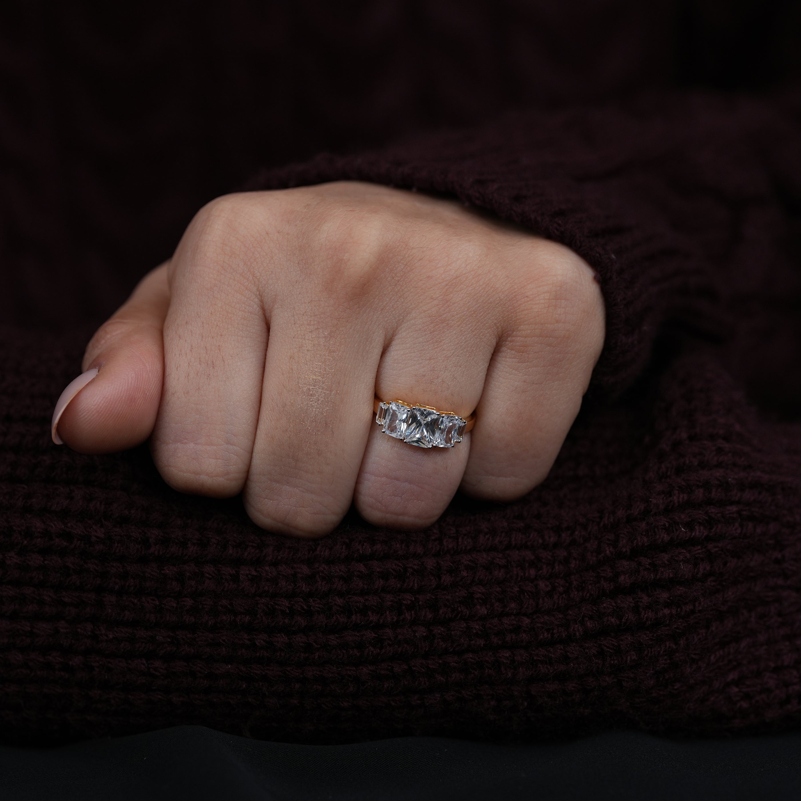 Classic three stone radiant diamond ring with lab grown center