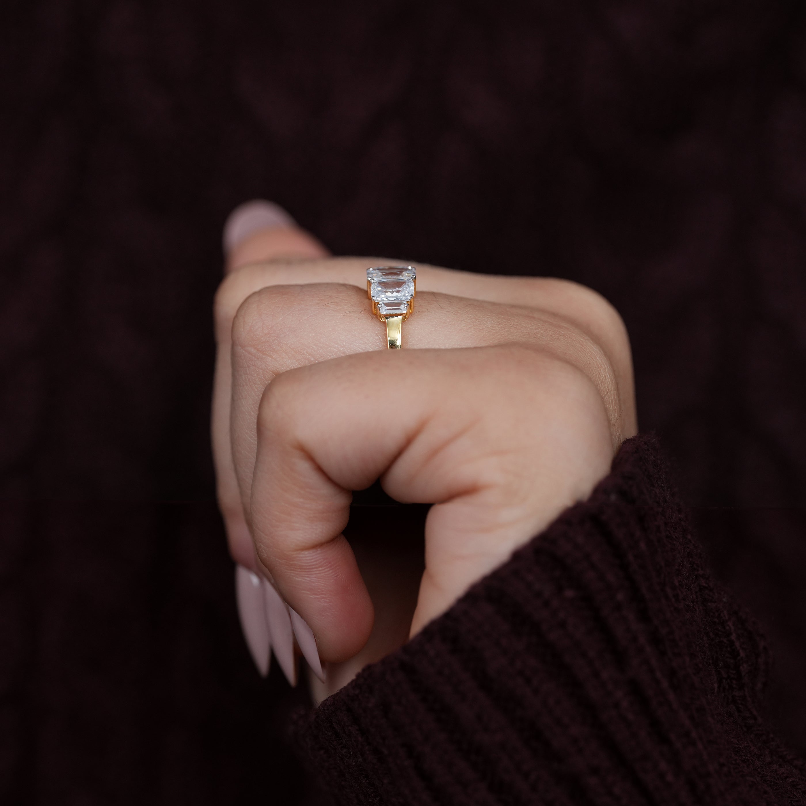 Timeless radiant cut three stone ring showcasing lab grown diamonds