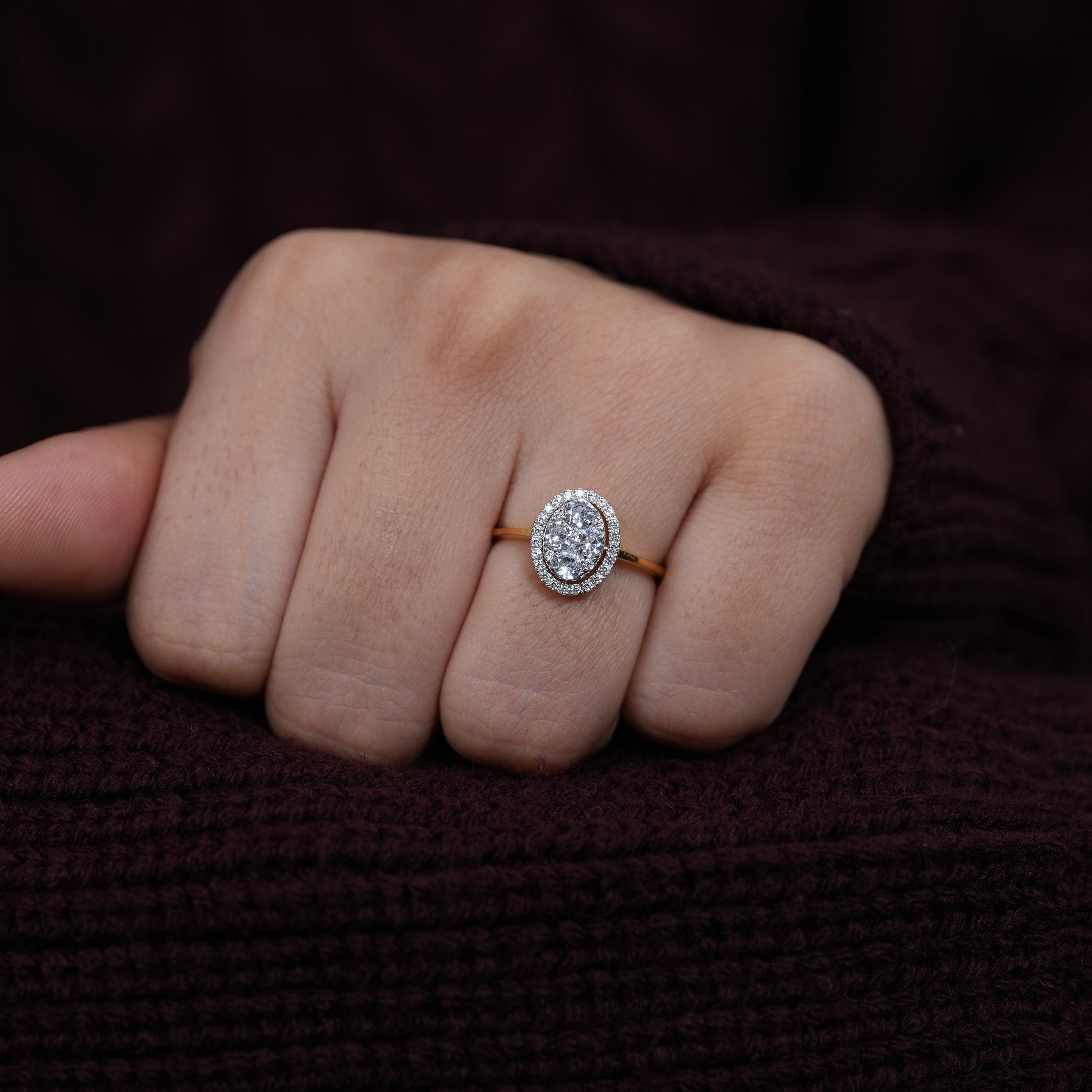 Oval lab grown diamond halo ring with slim polished gold band