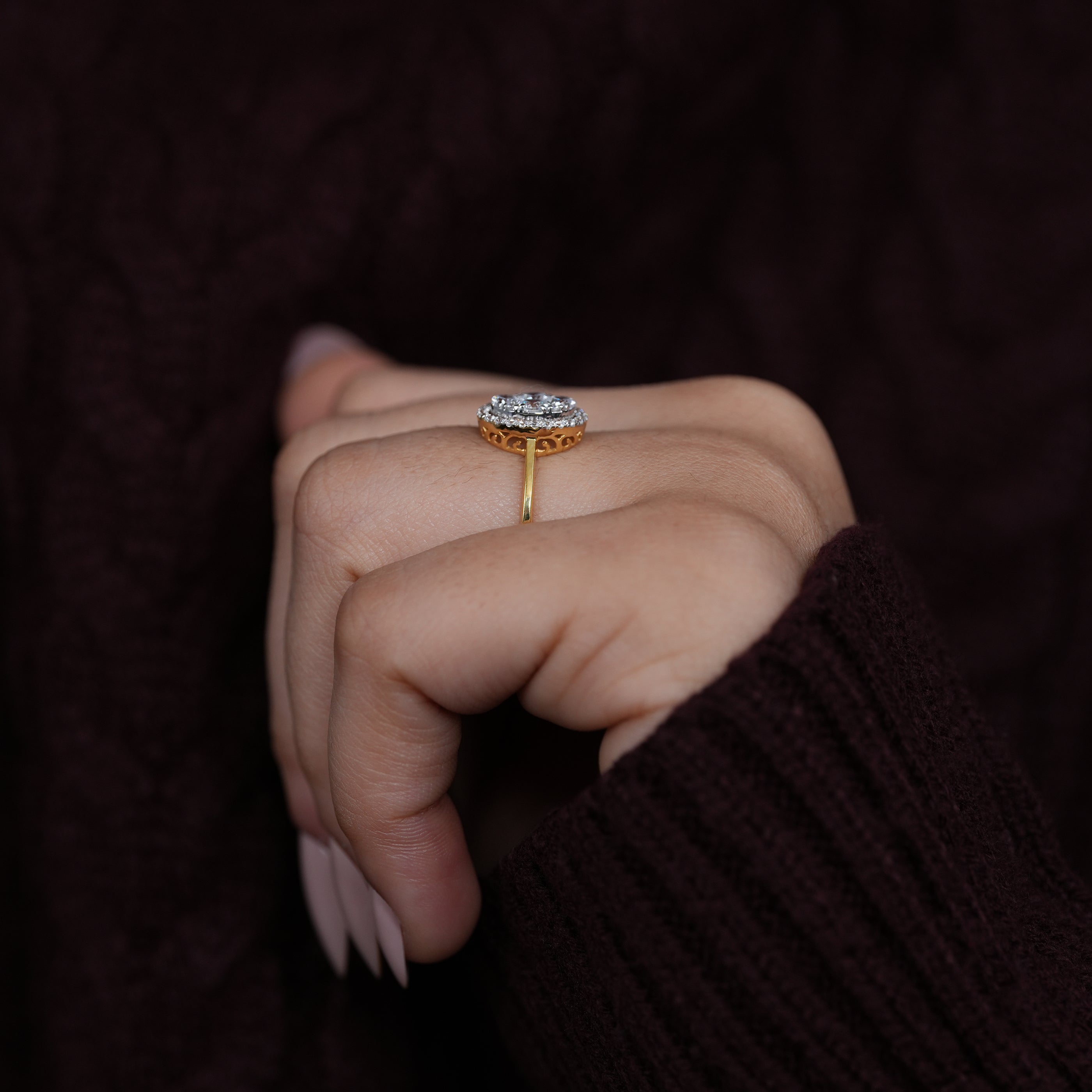 Oval floral style diamond cluster ring with lab grown stones