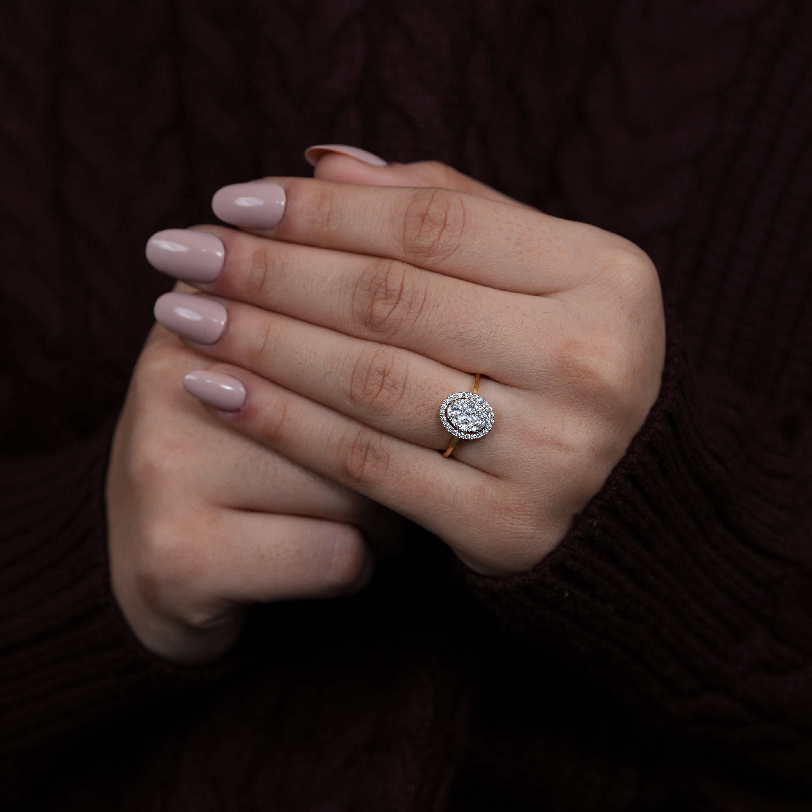 Timeless oval halo ring showcasing lab grown diamond cluster centerpiece