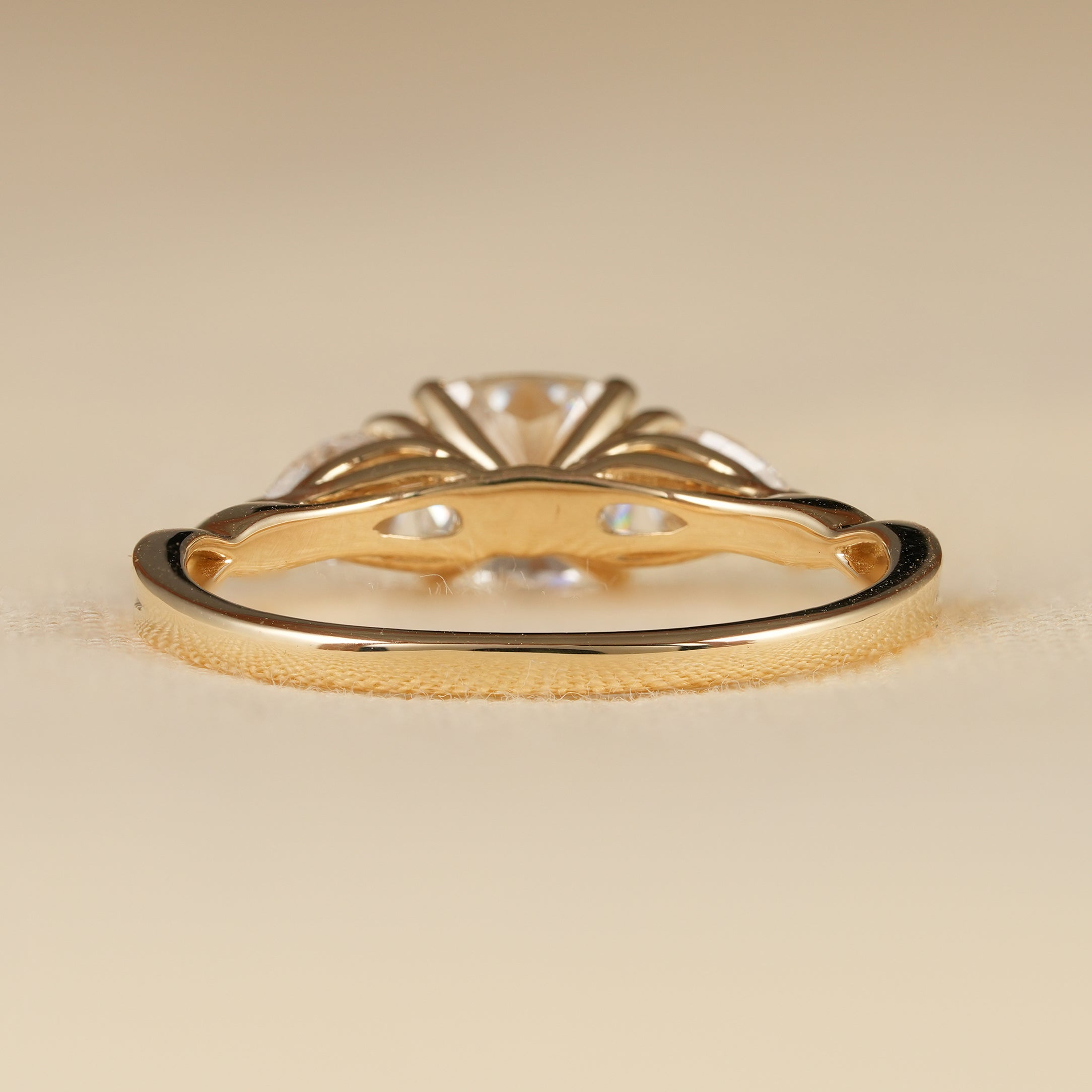 Elegant Three Stone Cushion Diamond Ring with Pear Side Diamonds