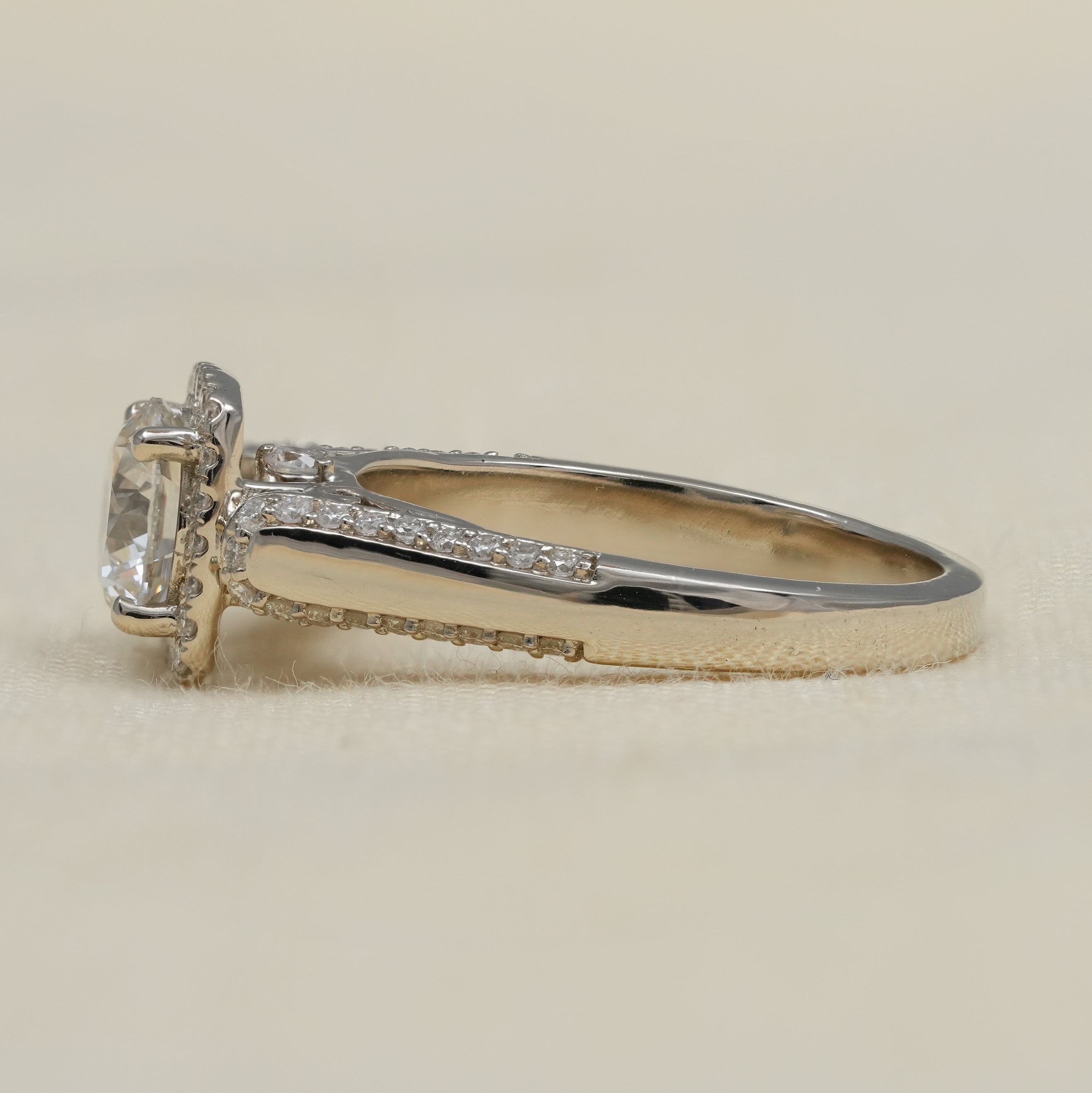Classic halo engagement ring with round lab grown diamond and pavé shank