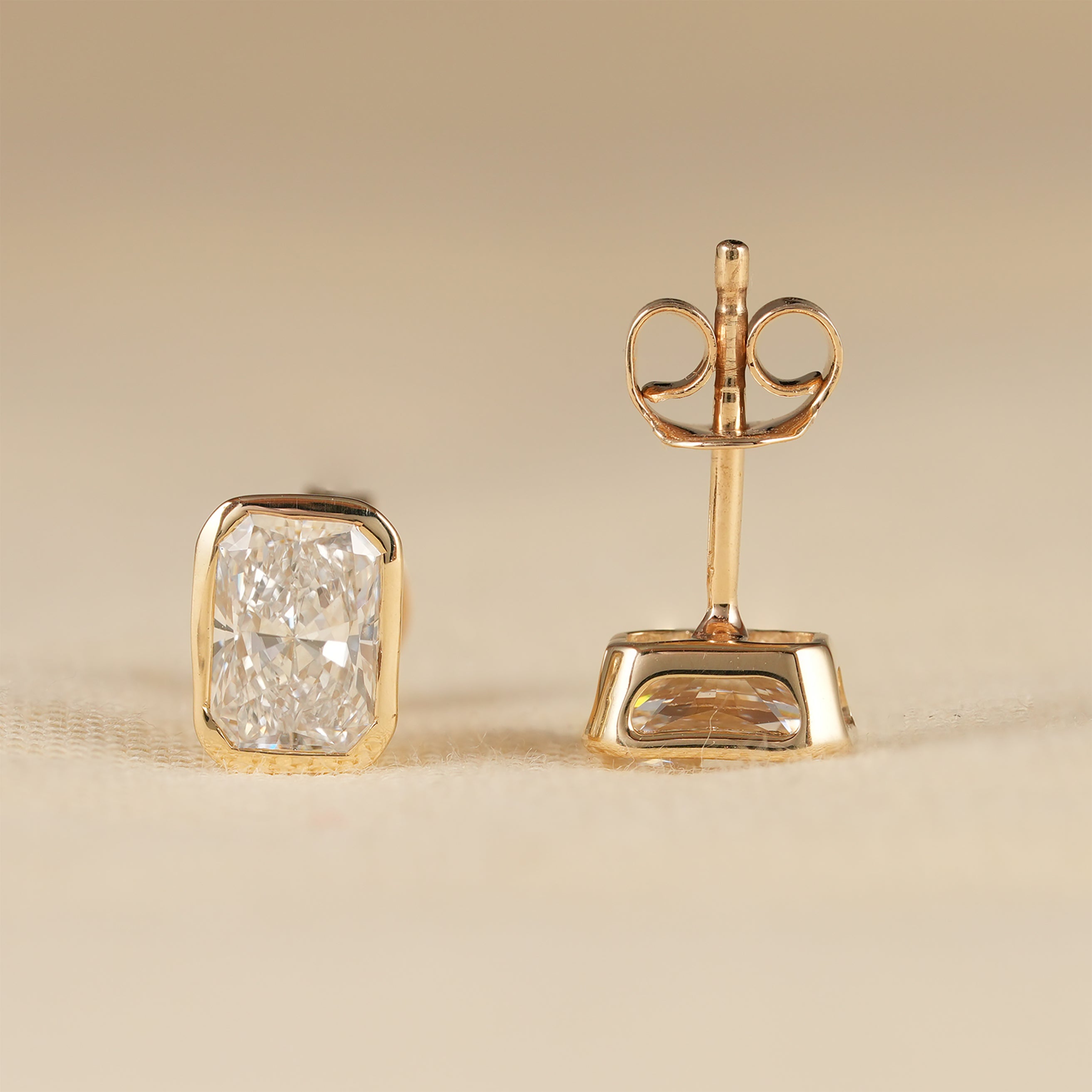 Luxury Radiant Cut Diamond Stud Earrings with Sleek Gold Design
