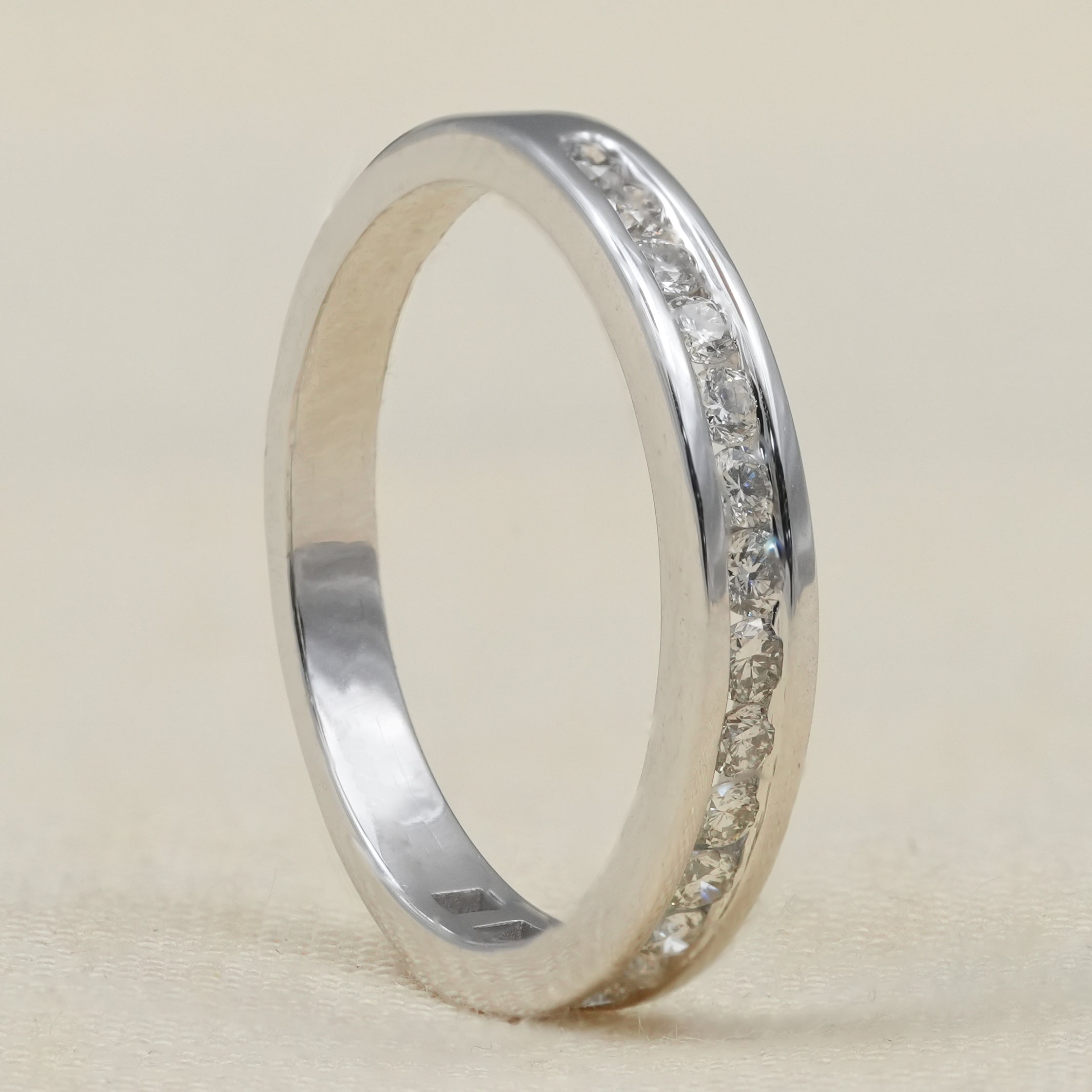 Slim lab grown diamond wedding band with continuous sparkle