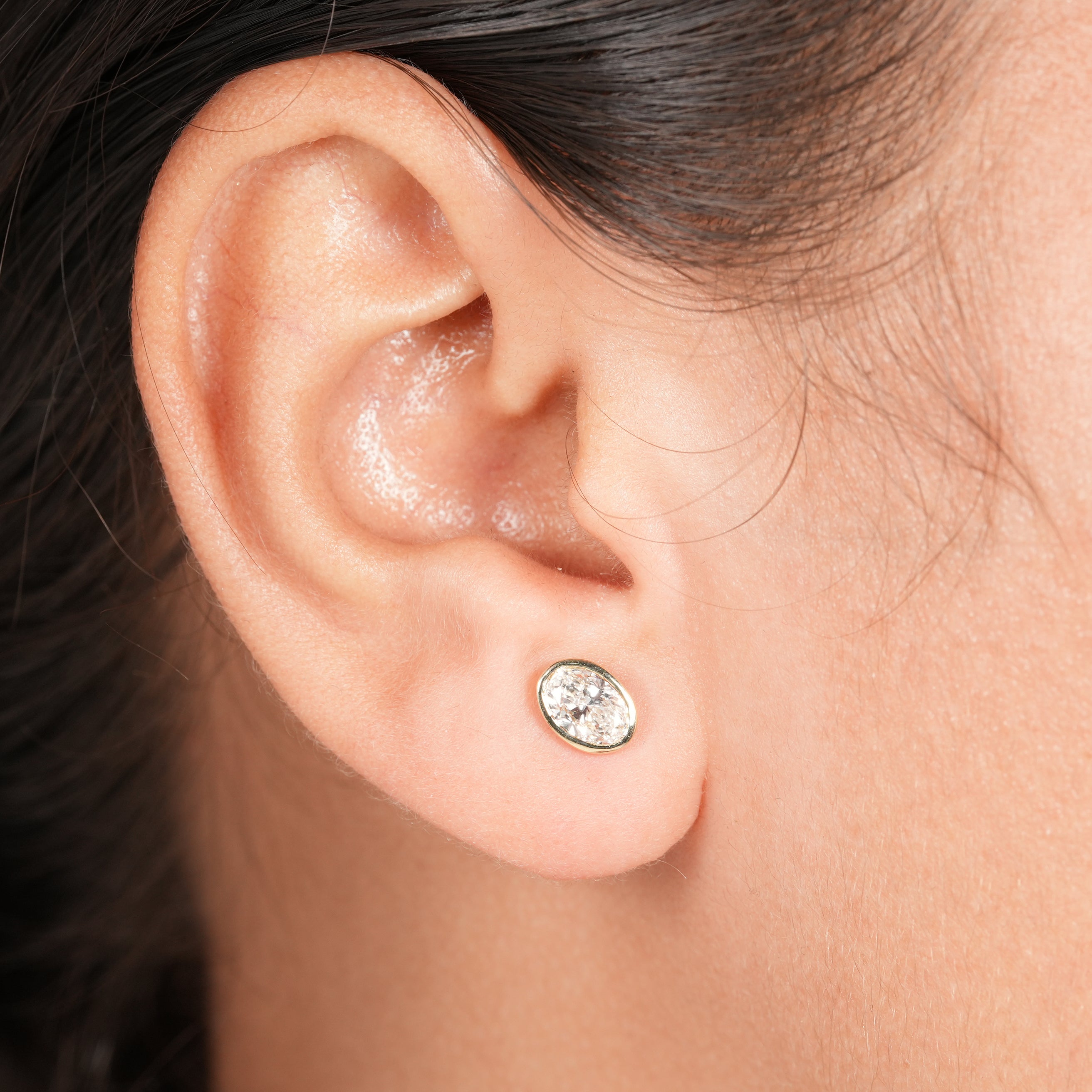 Modern Bezel Set Oval Diamond Earrings in Polished Yellow Gold