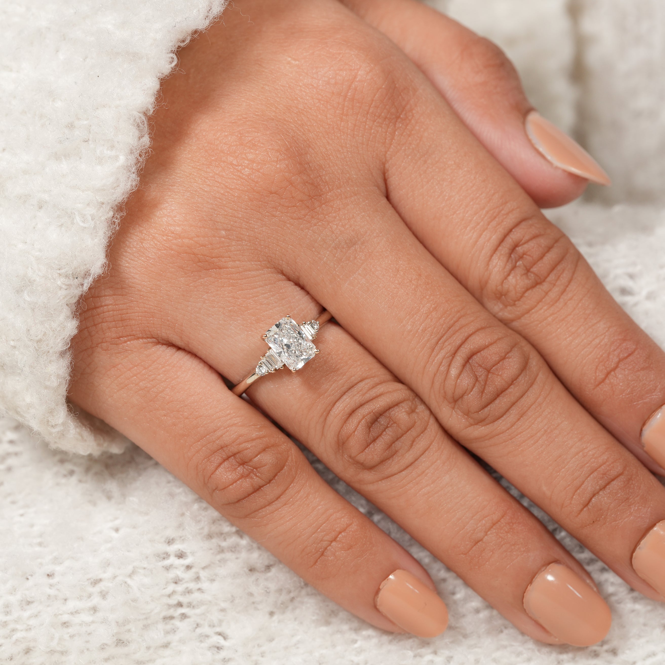 Classic Three Stone Radiant Diamond Ring with Baguette Diamonds