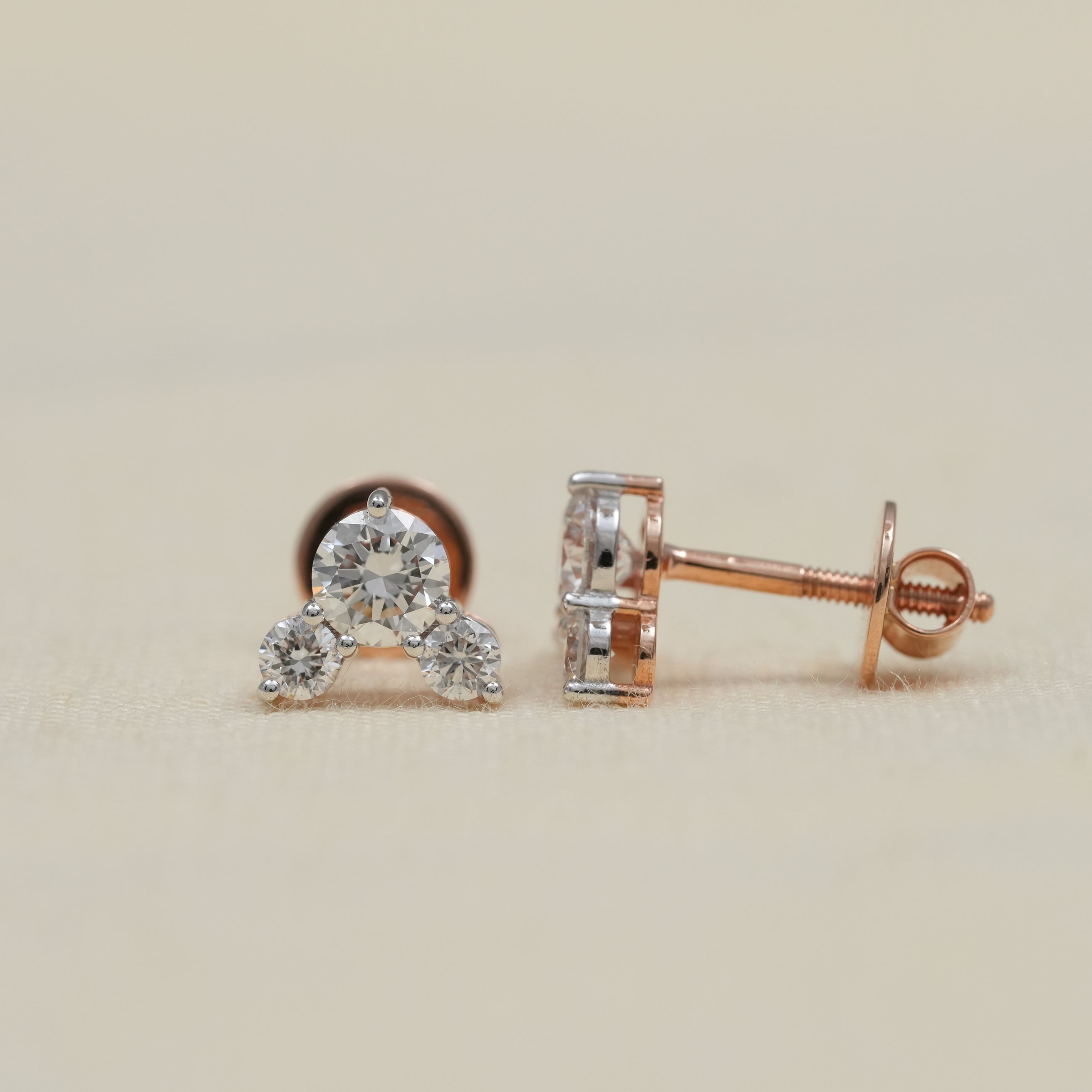 Elegant lab grown diamond stud earrings with triple stone design