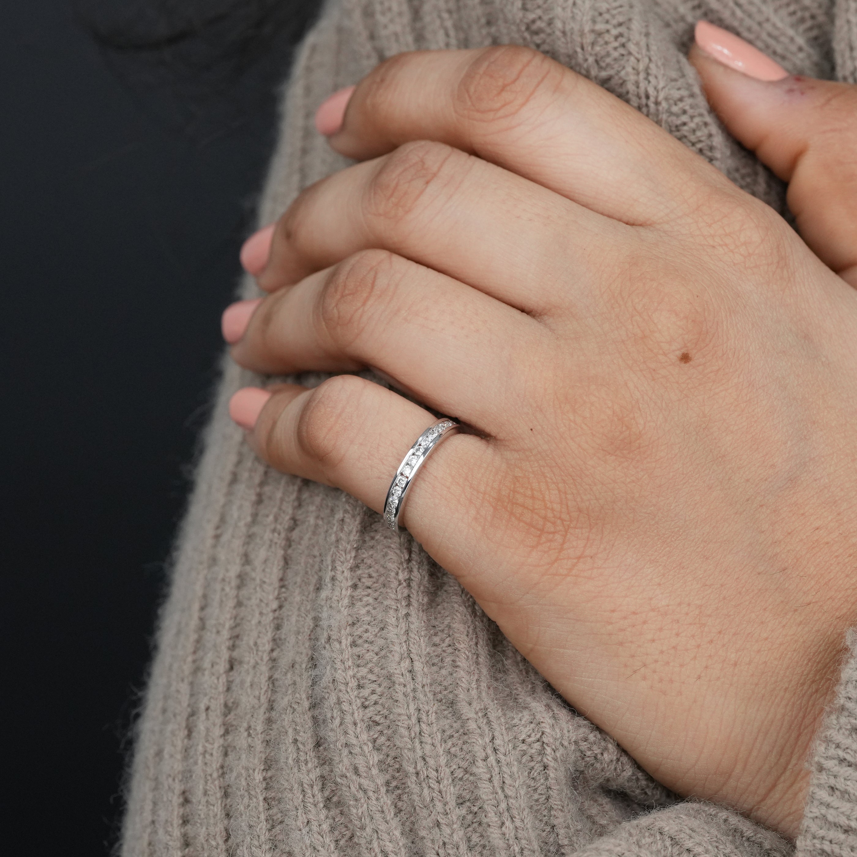 Simple lab grown diamond wedding band with clean channel setting