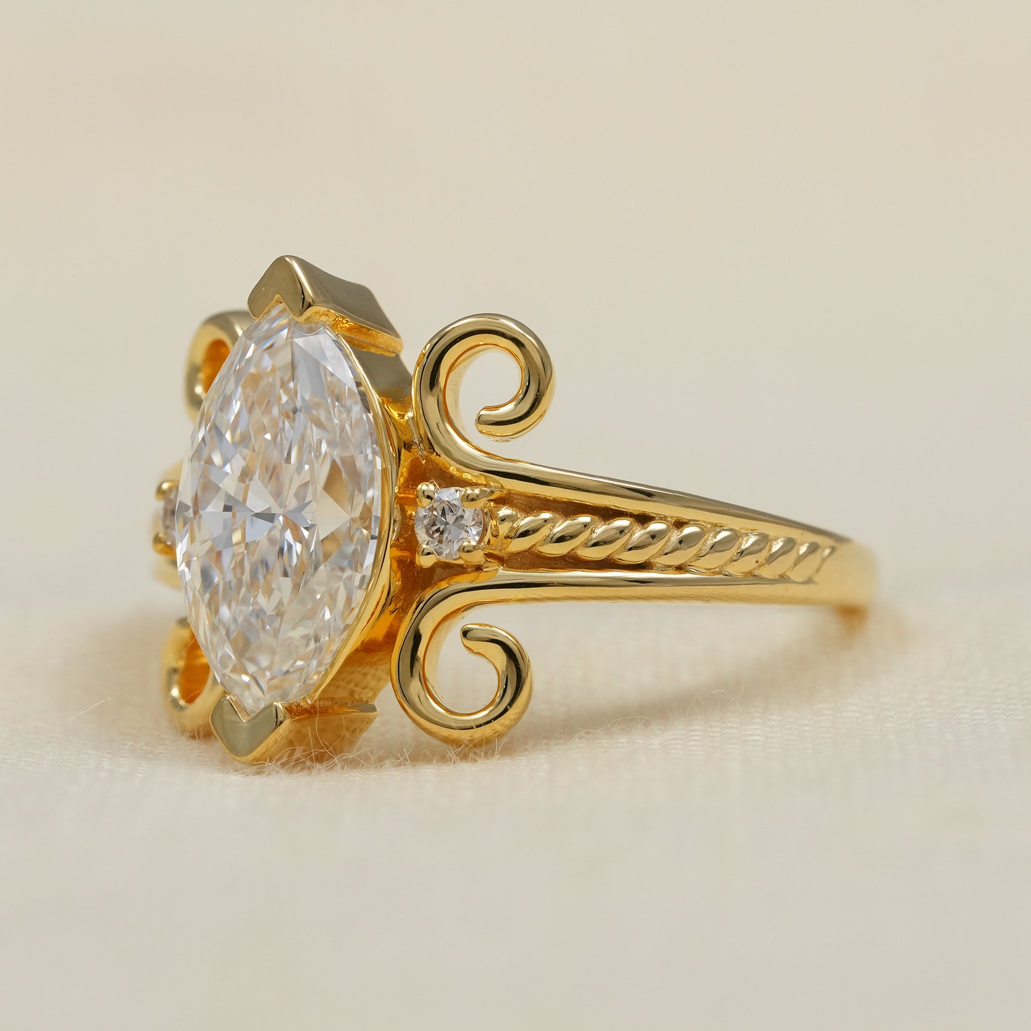 Antique inspired marquise lab grown diamond ring in polished yellow gold