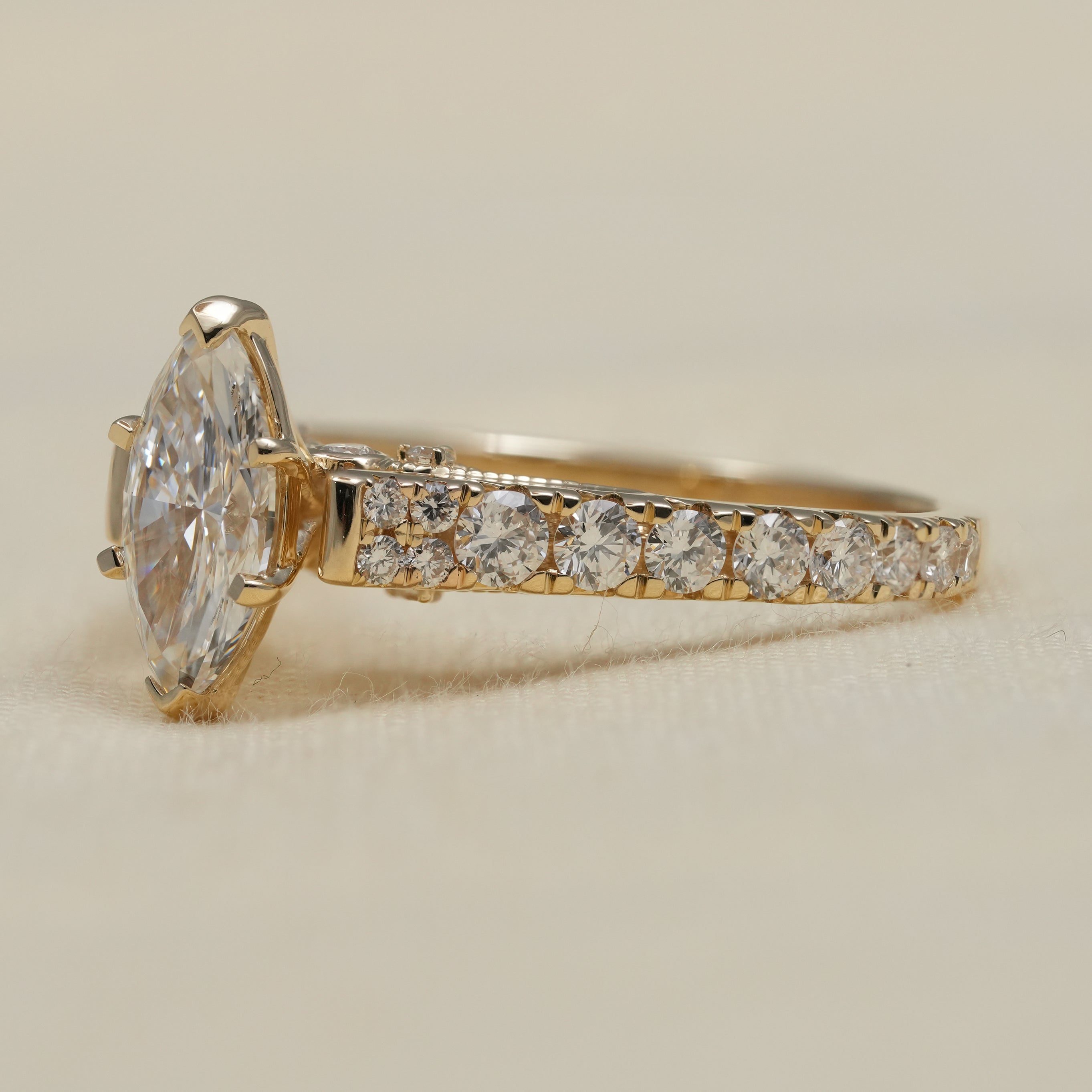 Luxury marquise lab grown diamond ring in polished yellow gold