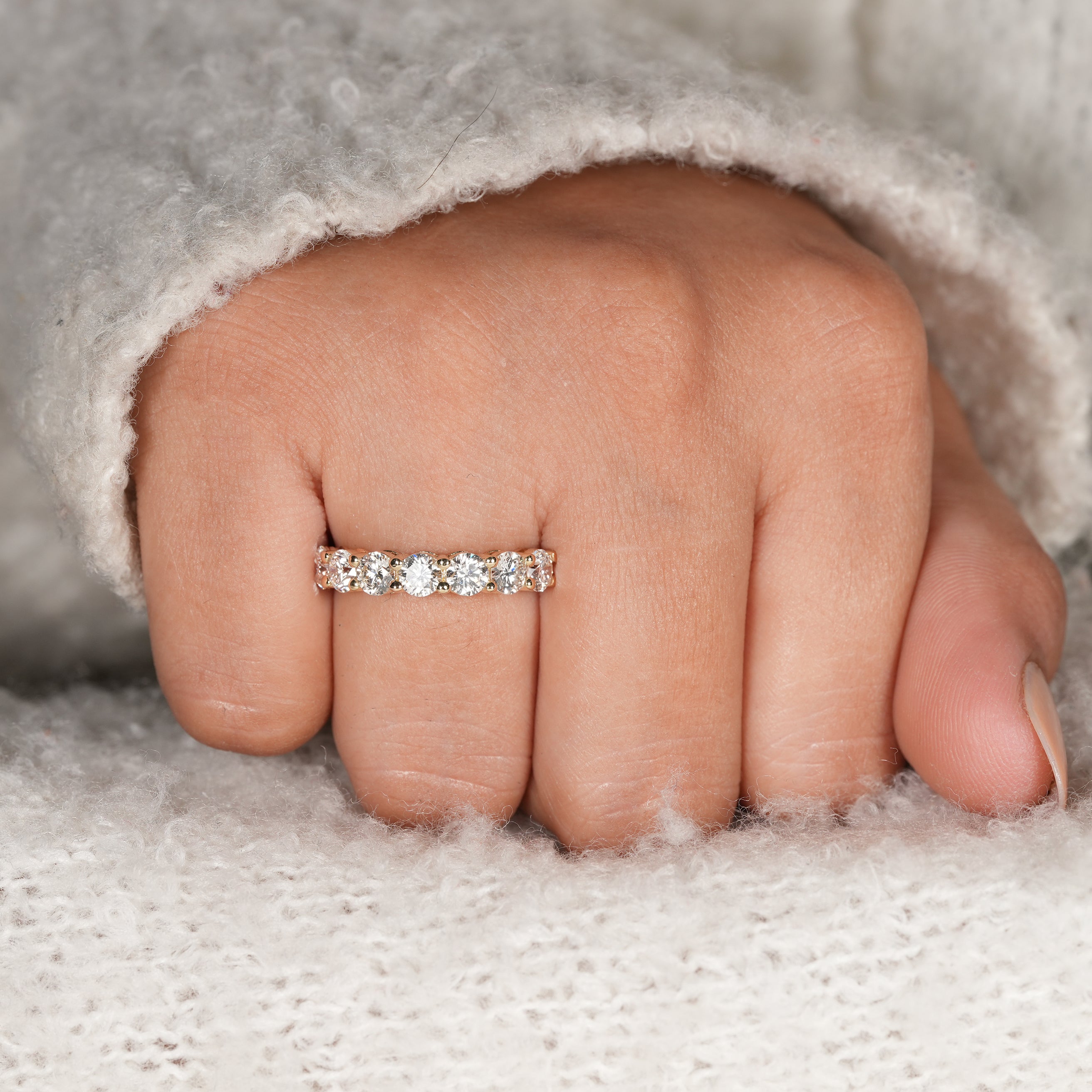 Timeless round diamond wedding ring with sleek gold band design