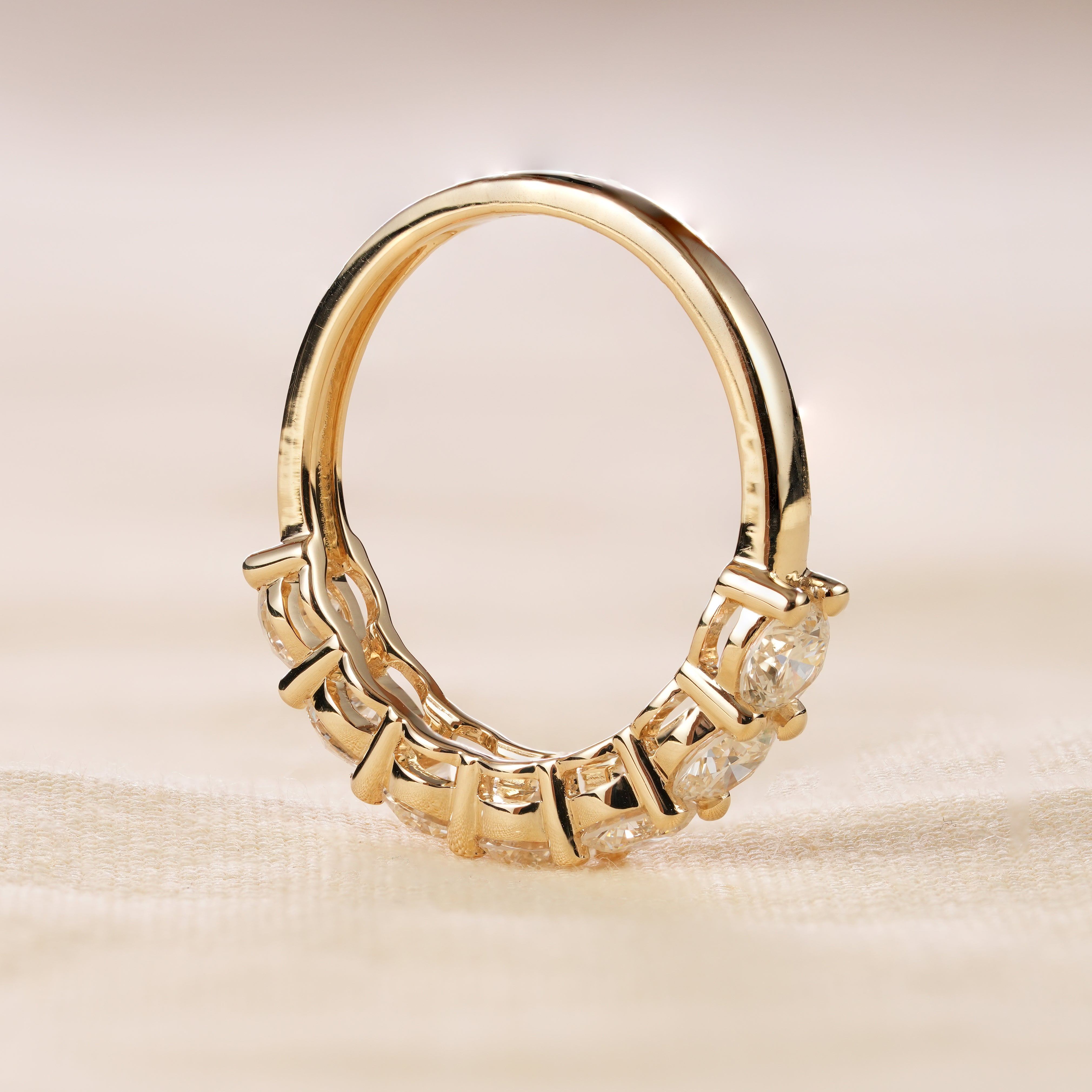 Yellow gold diamond stacking band with round cut brilliant diamonds