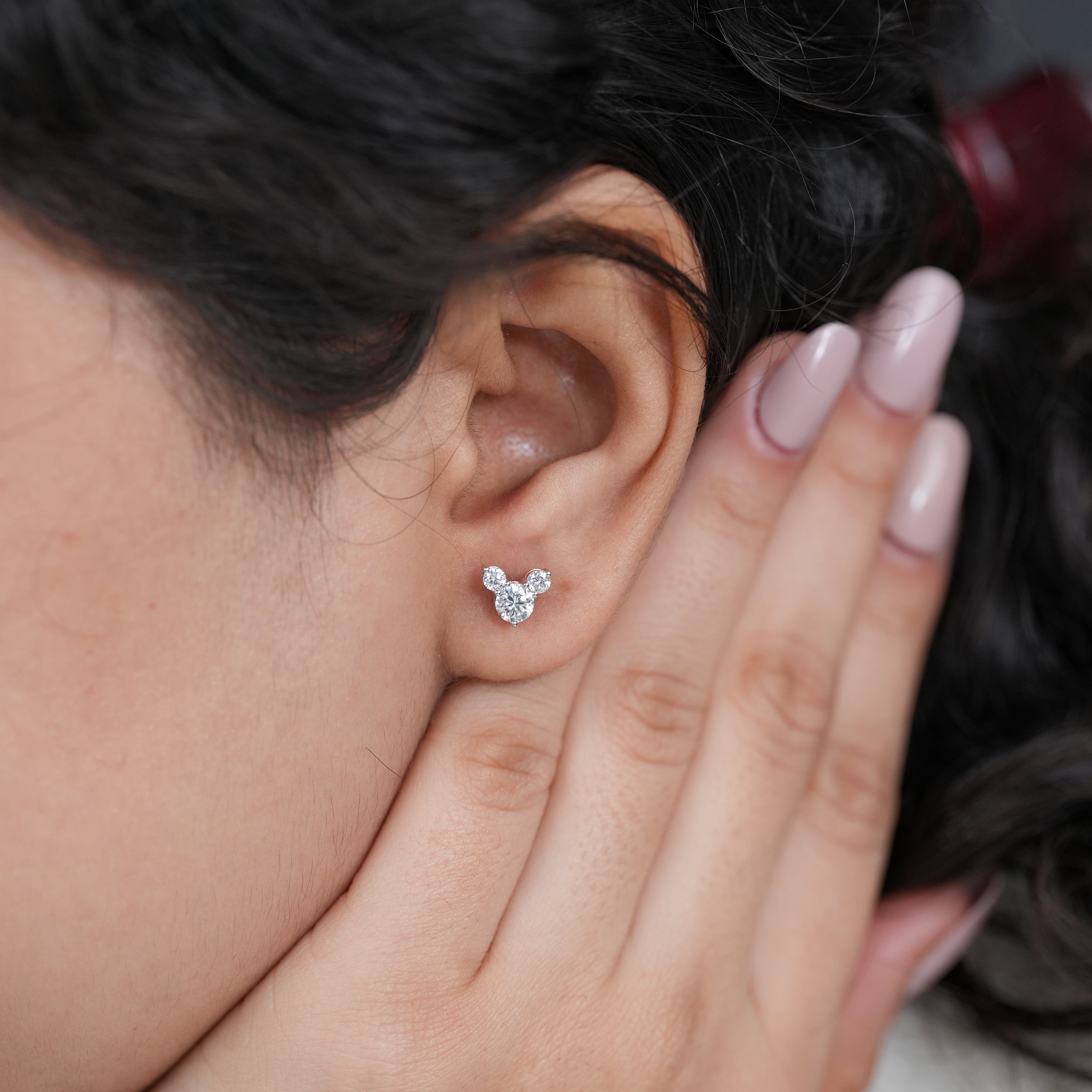 Close up round lab grown diamond cluster stud earrings