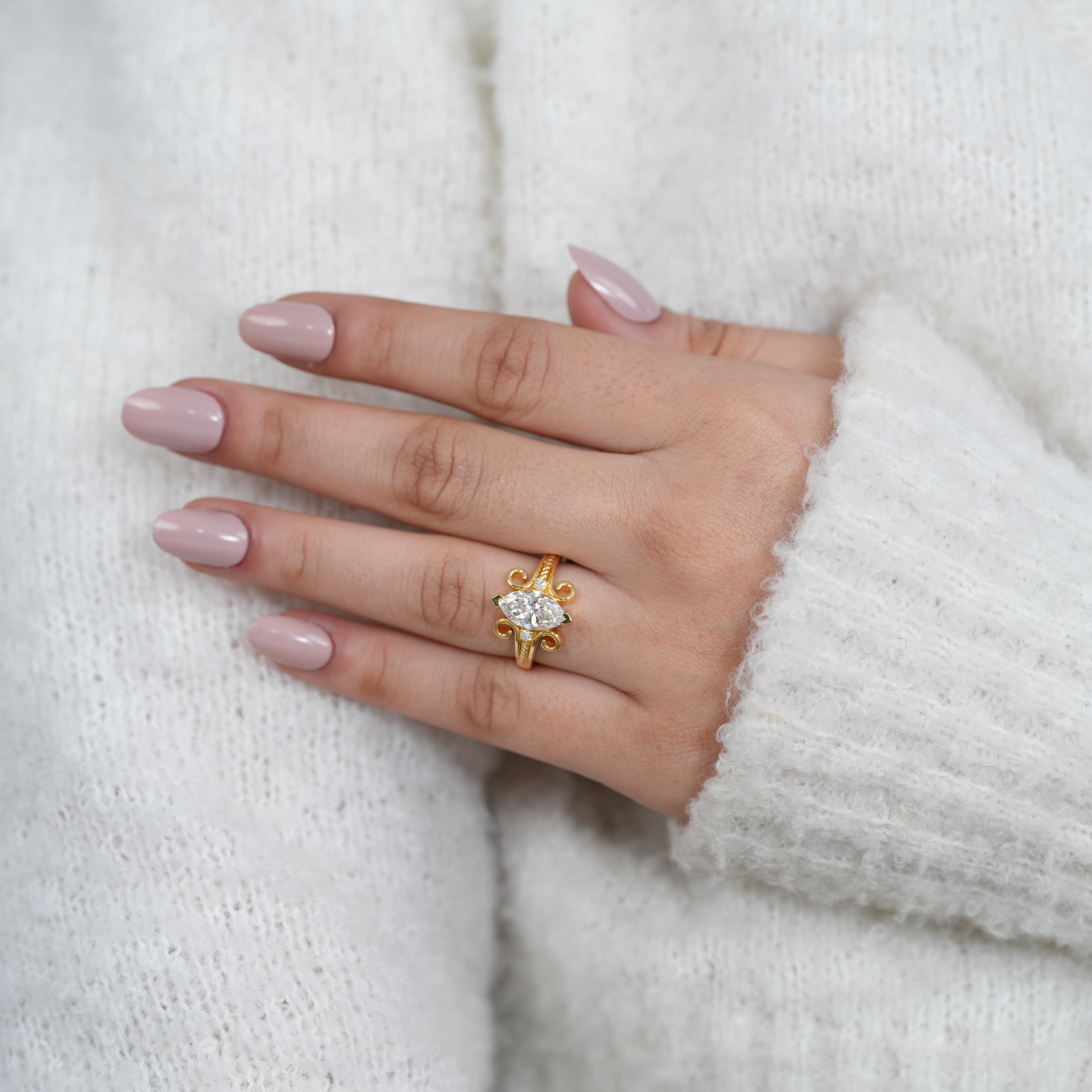 Romantic marquise lab grown diamond ring with intricate scrollwork design