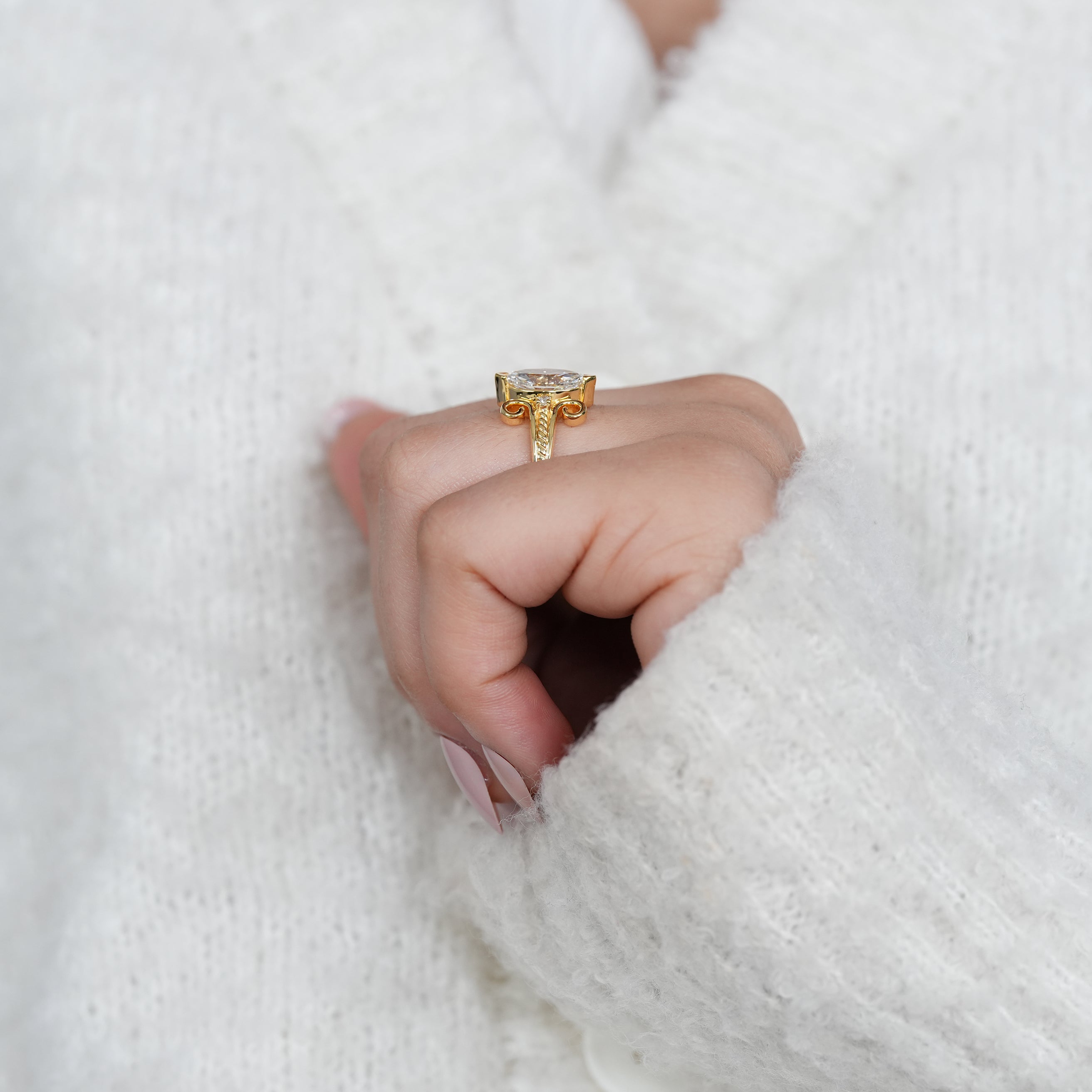 Artistic marquise lab grown diamond ring with sculpted yellow gold curves