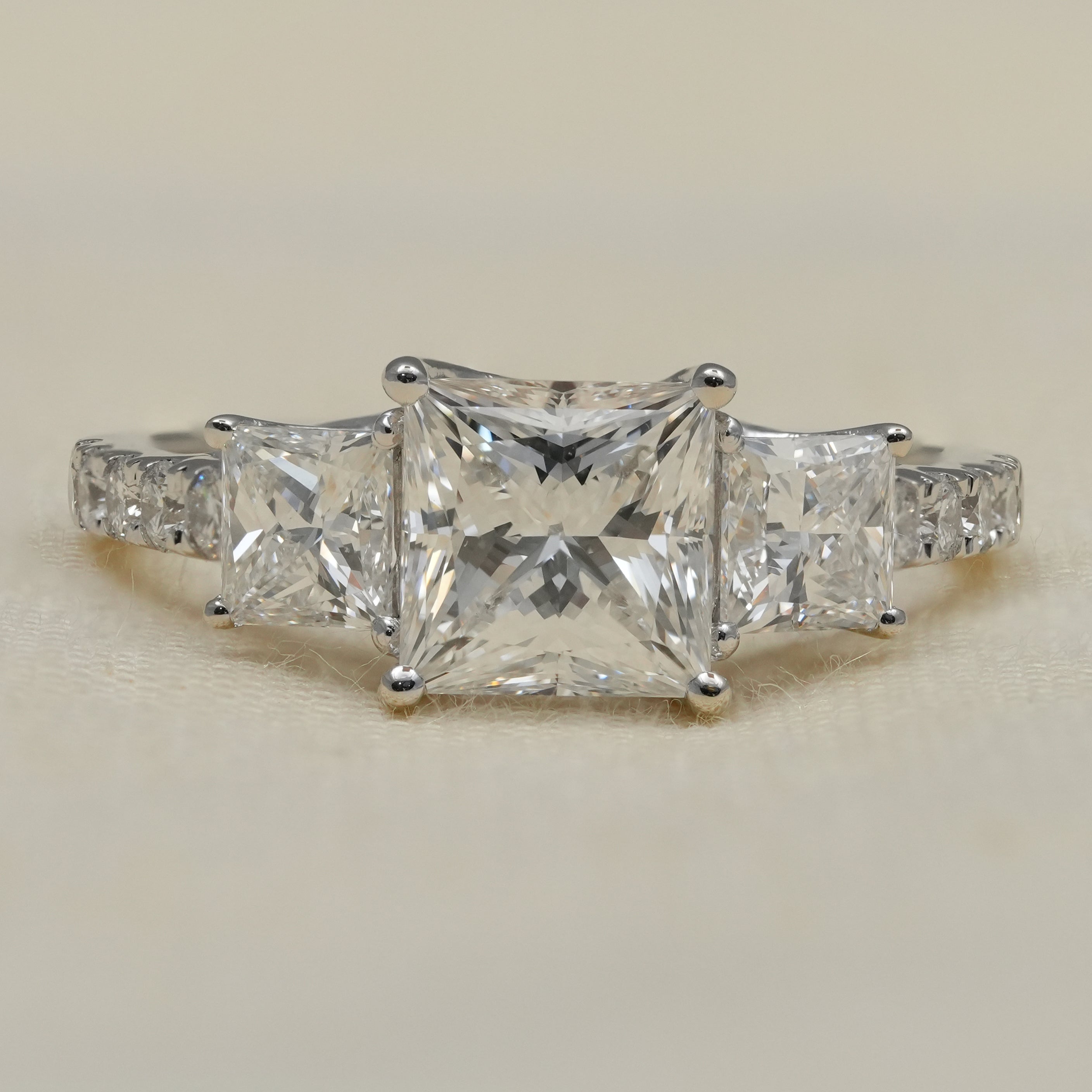 Princess cut three stone lab grown diamond engagement ring white gold
