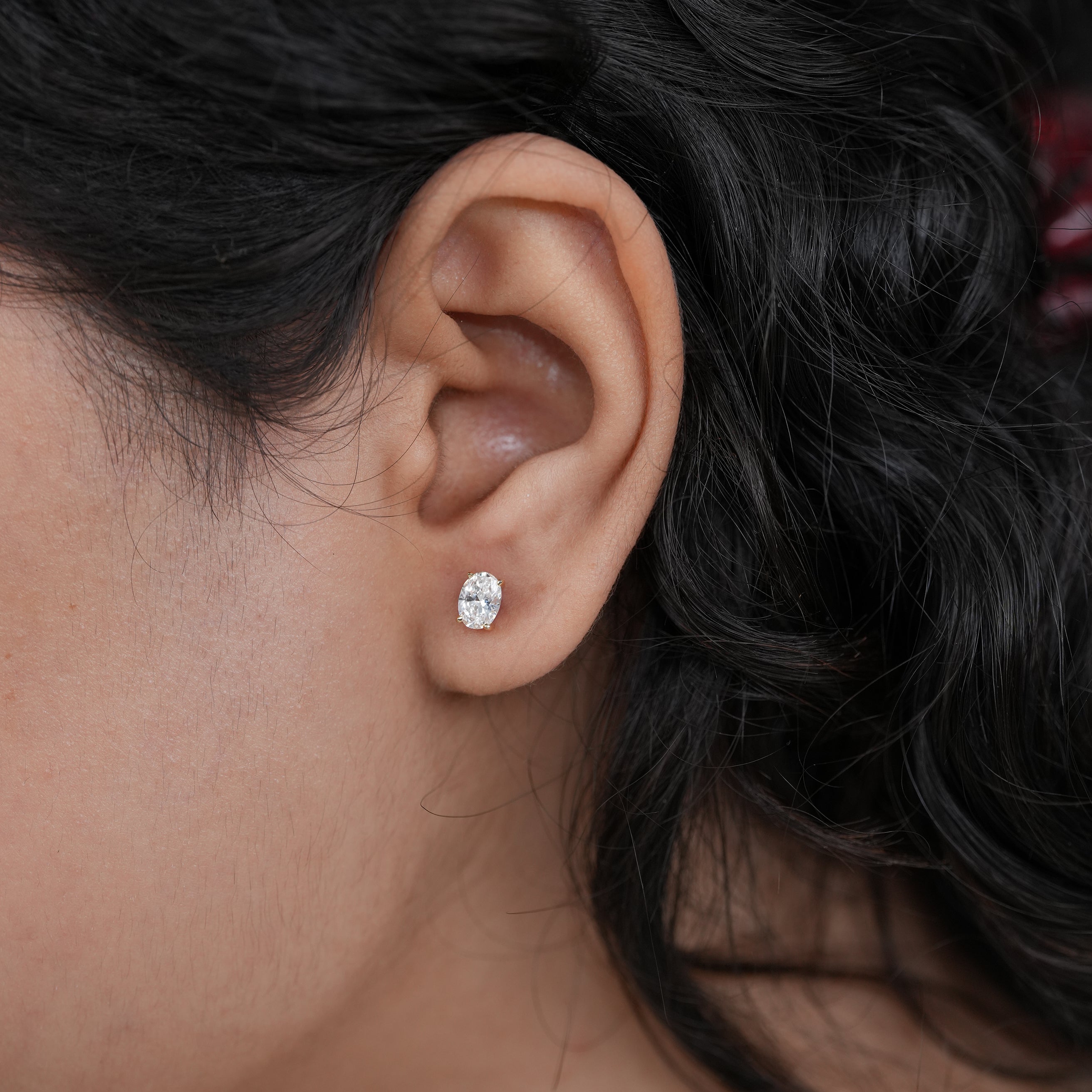 Front view oval lab grown diamond studs highlighting brilliance and minimal design